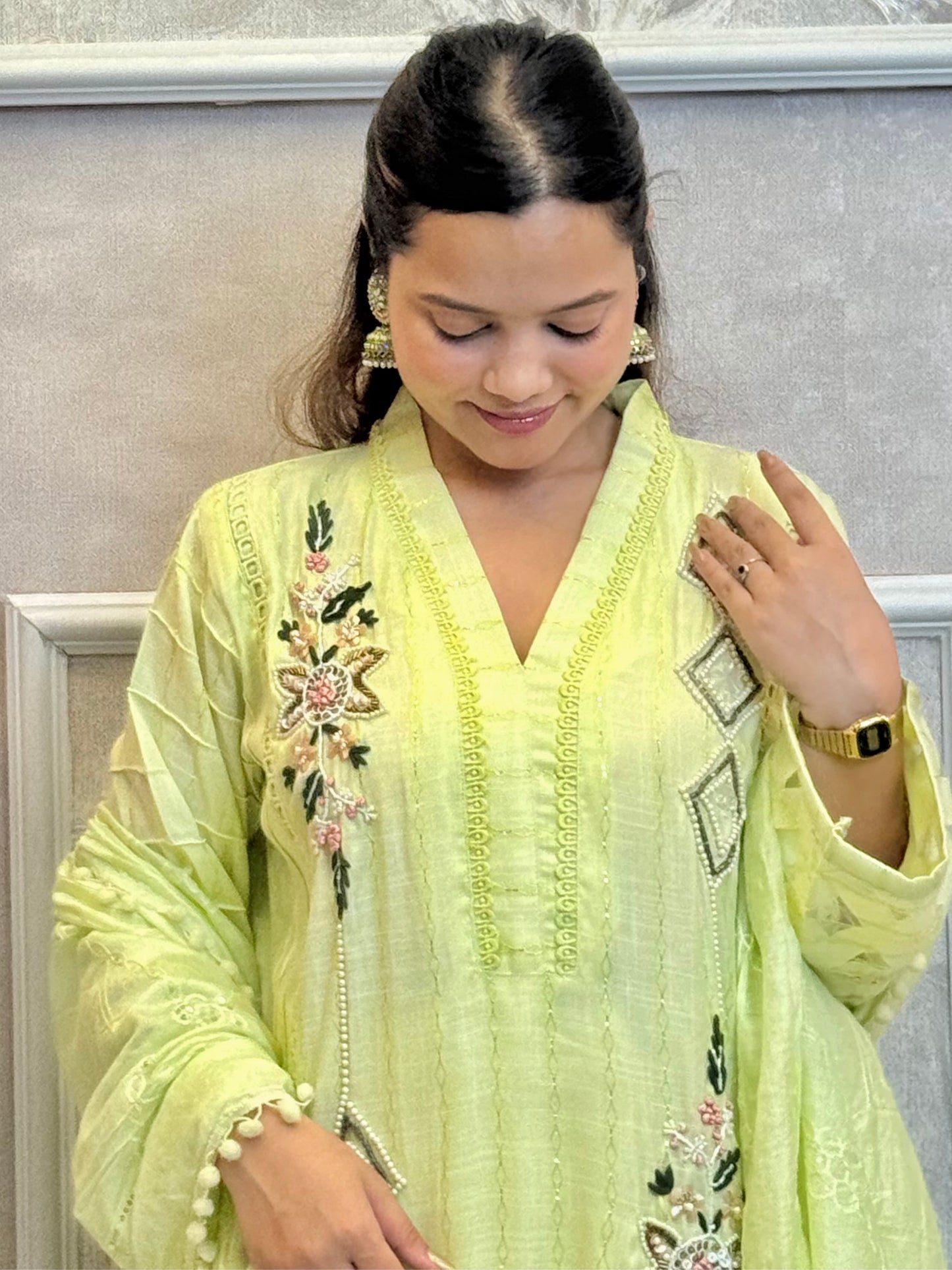 Model wearing a lime green rayon kurta with hand embroidery, paired with rayon pants and a chanderi dupatta – Designer Wear Collection.