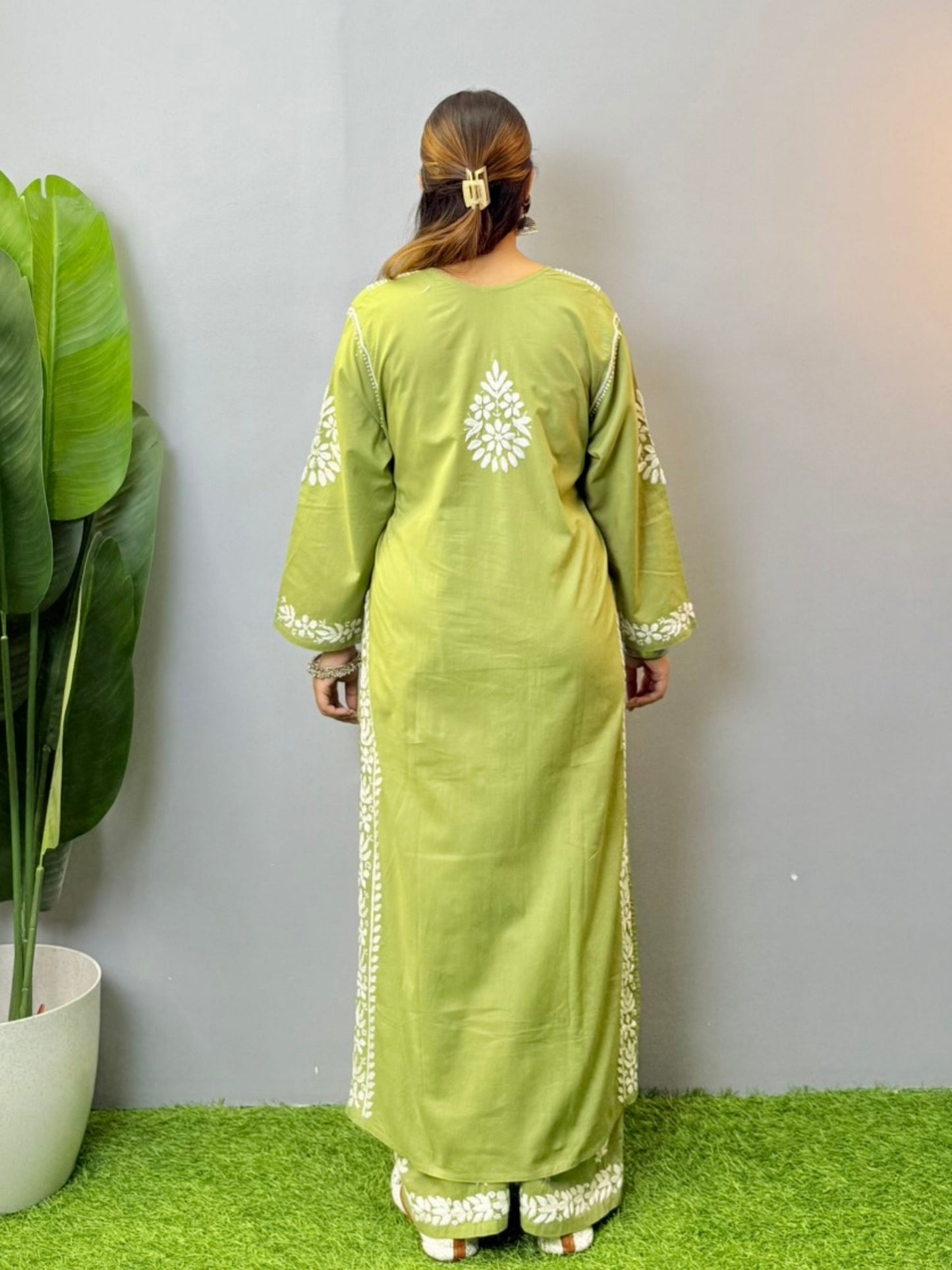 Olive green chikankari kurta with palazzo set in cotton fabric featuring hand embroidery