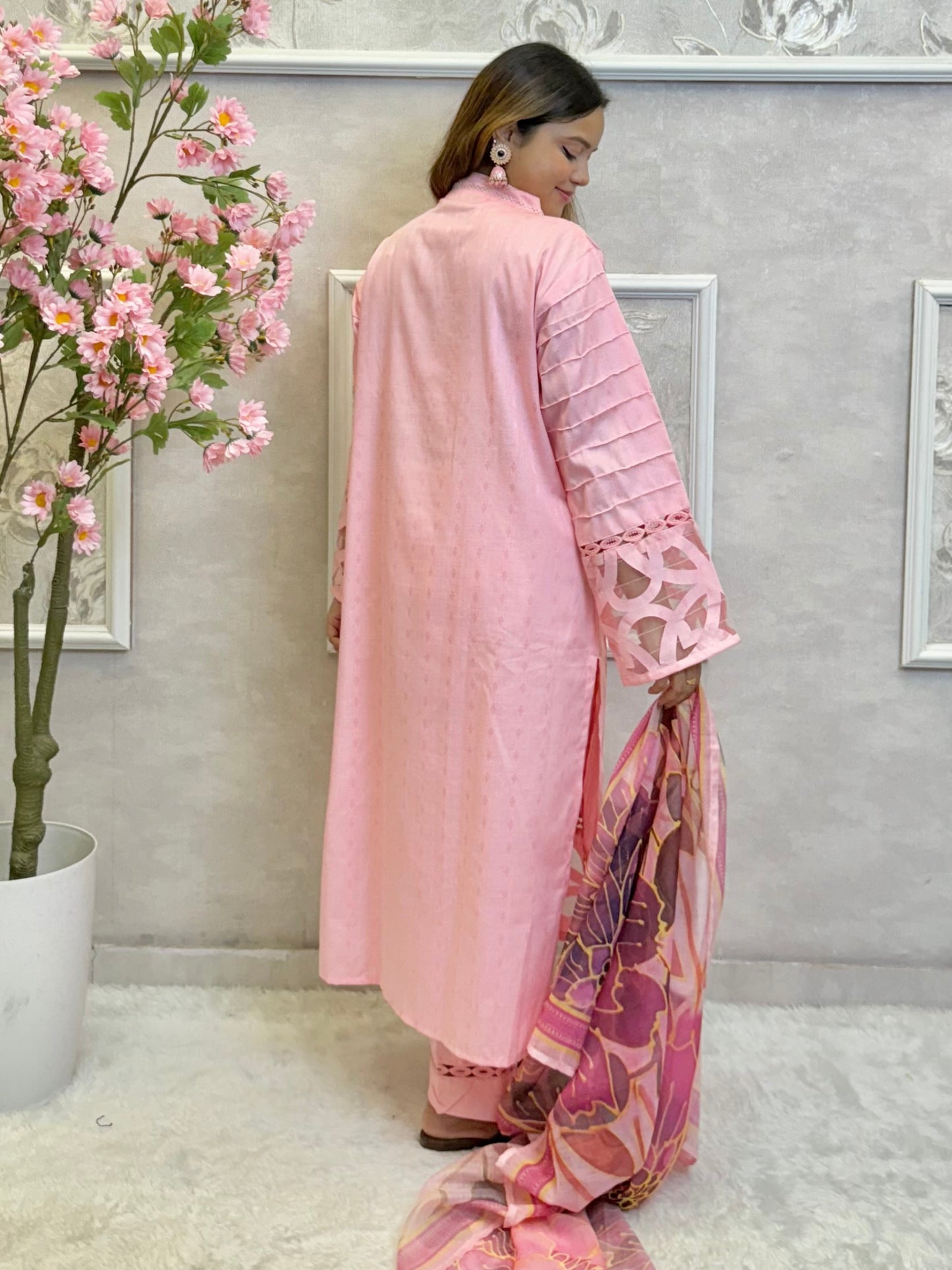 Model wearing a blush pink rayon embroidered kurta with rayon pants and a printed chanderi dupatta – Designer Wear Collection.