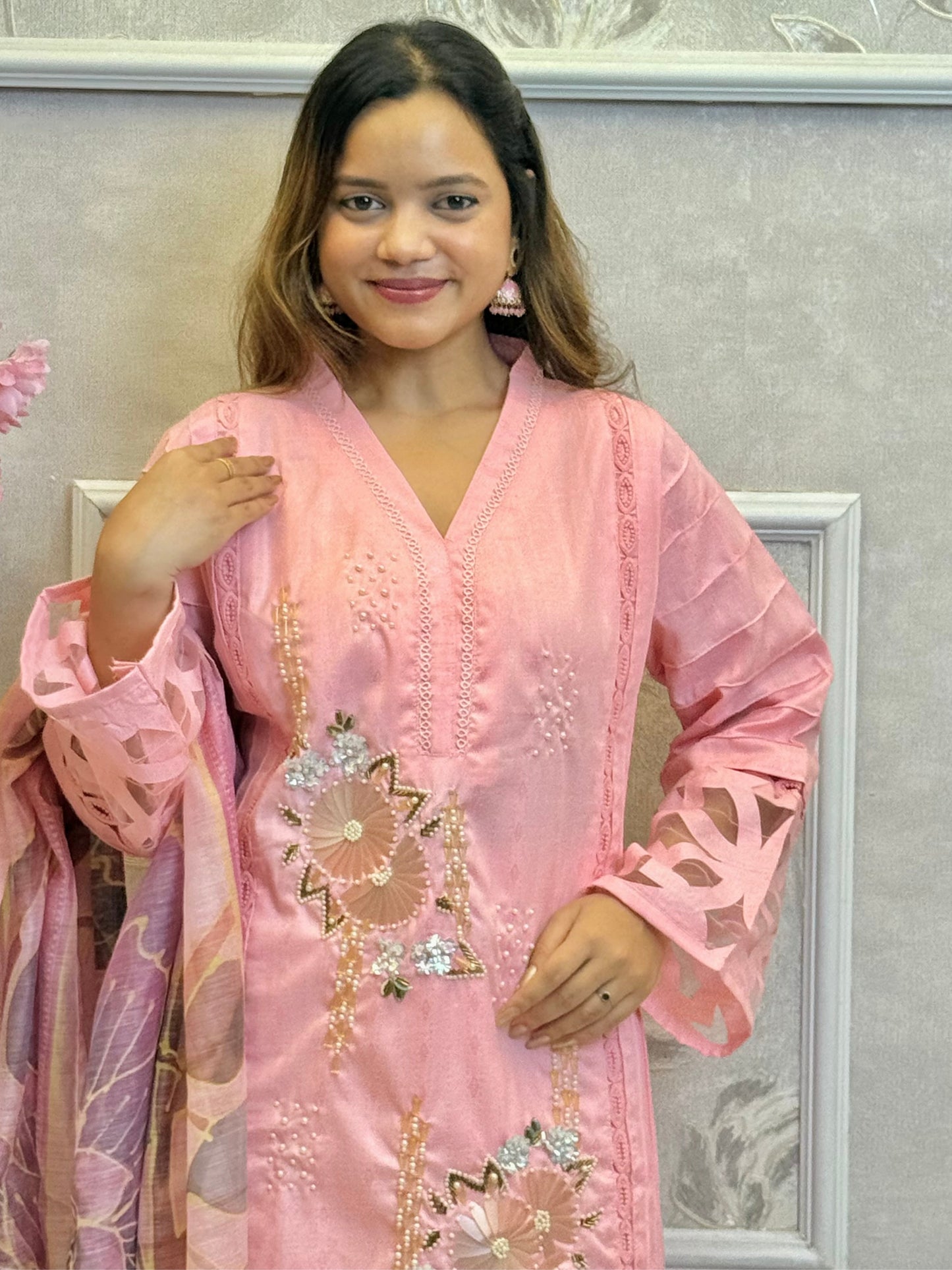 Model wearing a blush pink rayon embroidered kurta with rayon pants and a printed chanderi dupatta – Designer Wear Collection.