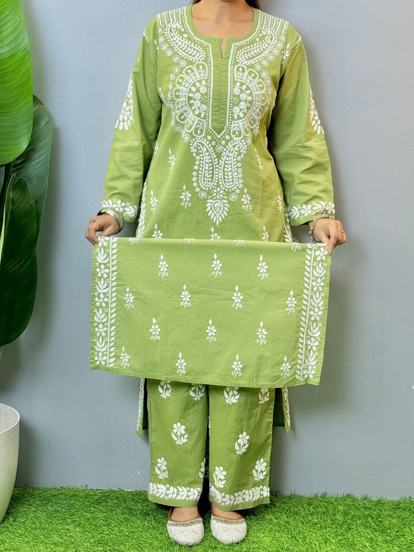 Olive green chikankari kurta with palazzo set in cotton fabric featuring hand embroidery