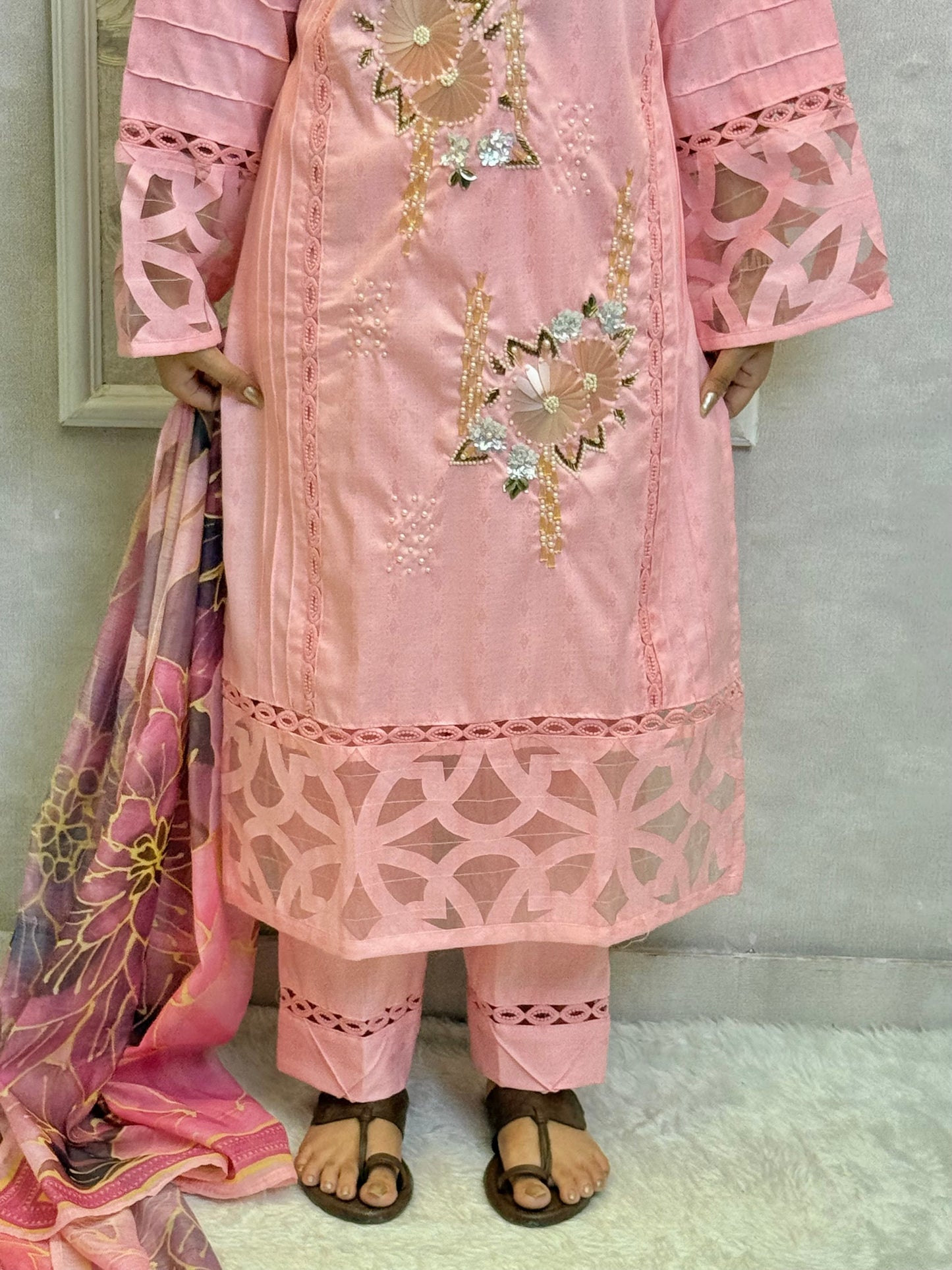 Model wearing a blush pink rayon embroidered kurta with rayon pants and a printed chanderi dupatta – Designer Wear Collection.