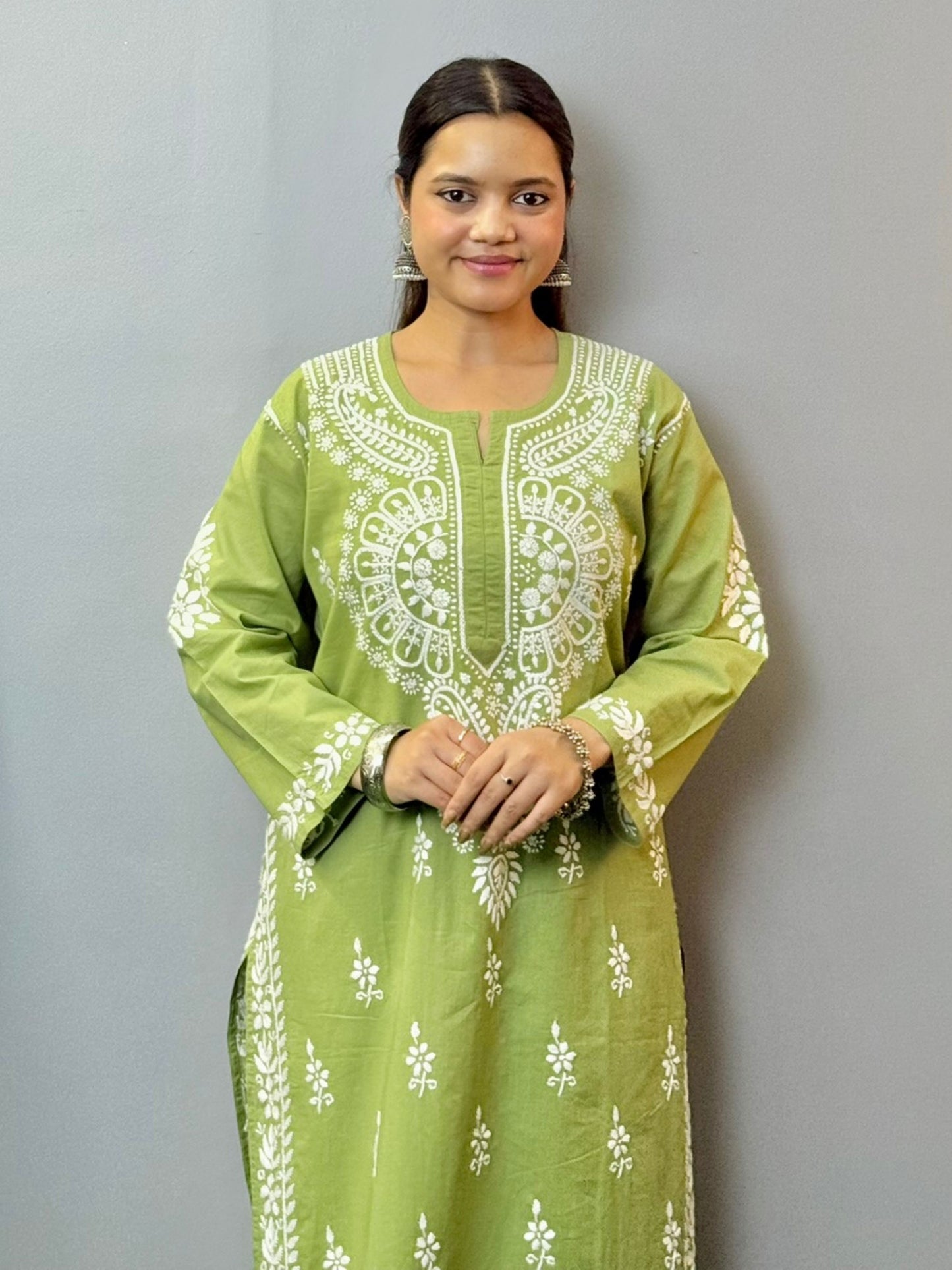 Olive green chikankari kurta with palazzo set in cotton fabric featuring hand embroidery