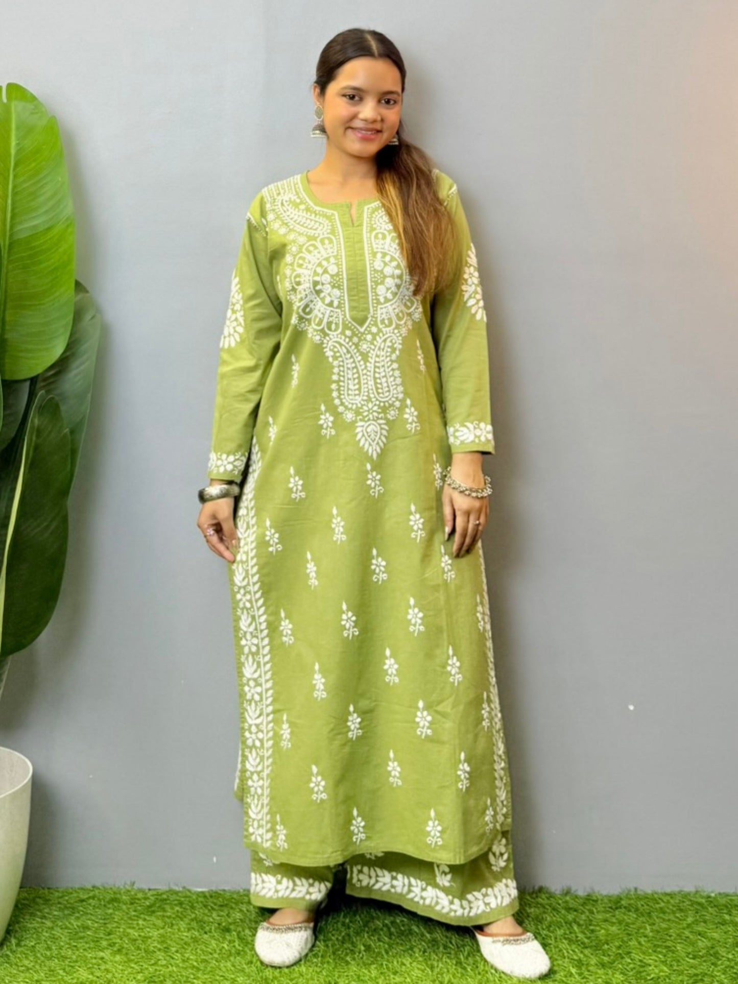 Olive green chikankari kurta with palazzo set in cotton fabric featuring hand embroidery