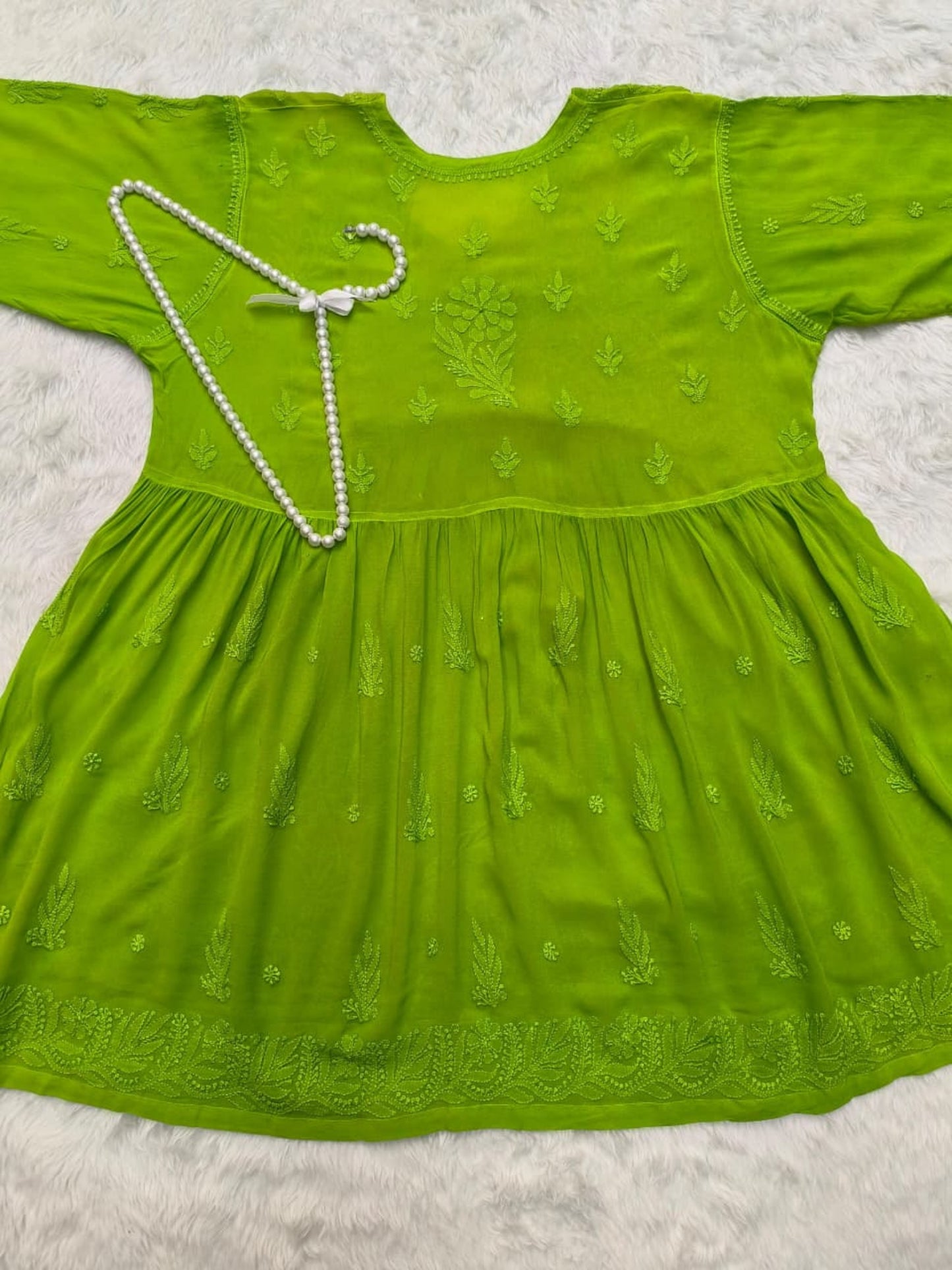 Green Lucknow Chikankari viscose short kurta with hand embroidery in Angrakha style