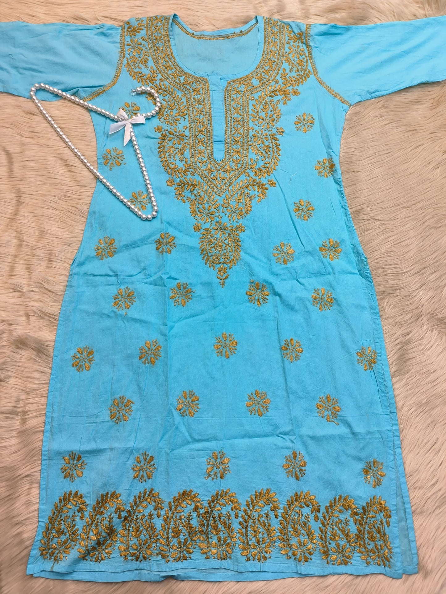 Sky blue cotton chikankari kurta with mustard hand embroidery, ideal for casual wear