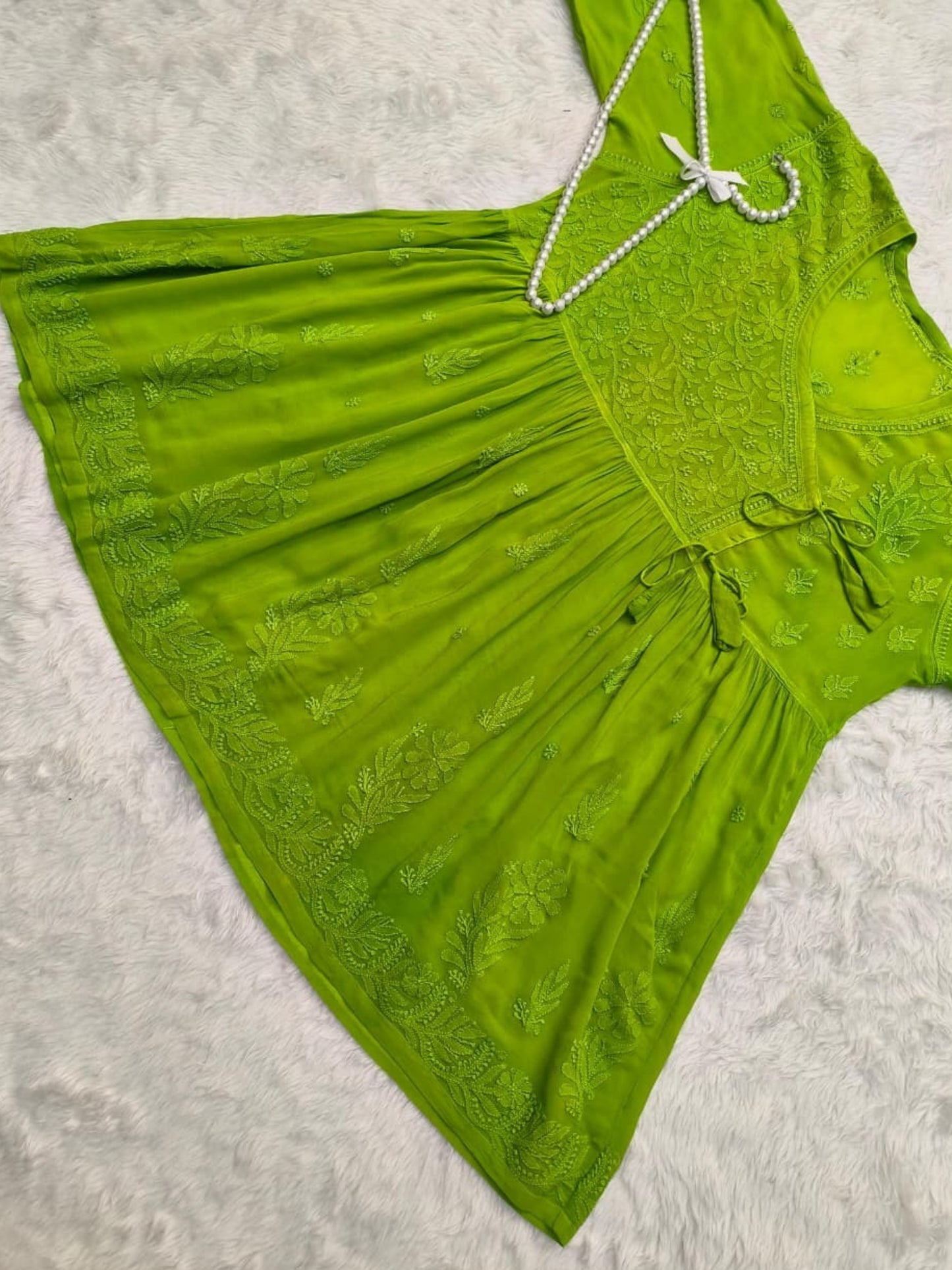 Green Lucknow Chikankari viscose short kurta with hand embroidery in Angrakha style