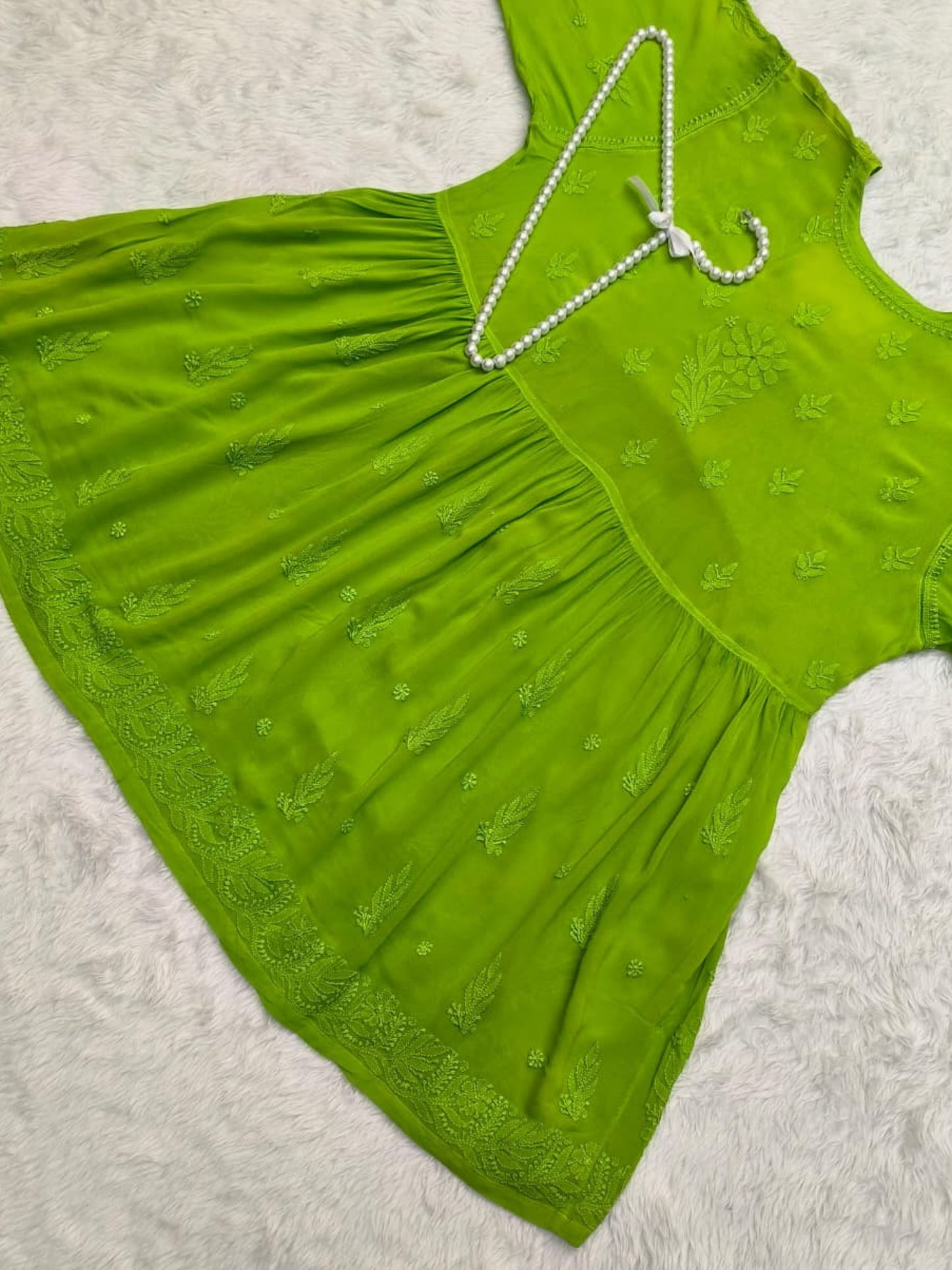 Green Lucknow Chikankari viscose short kurta with hand embroidery in Angrakha style