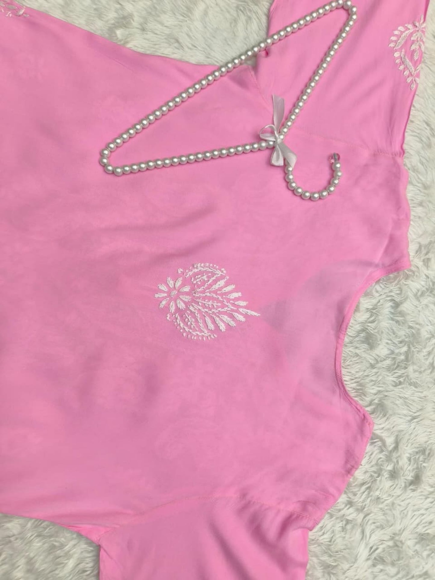 Pink rayon Lucknow chikankari kurta with hand embroidery – soft and comfortable.