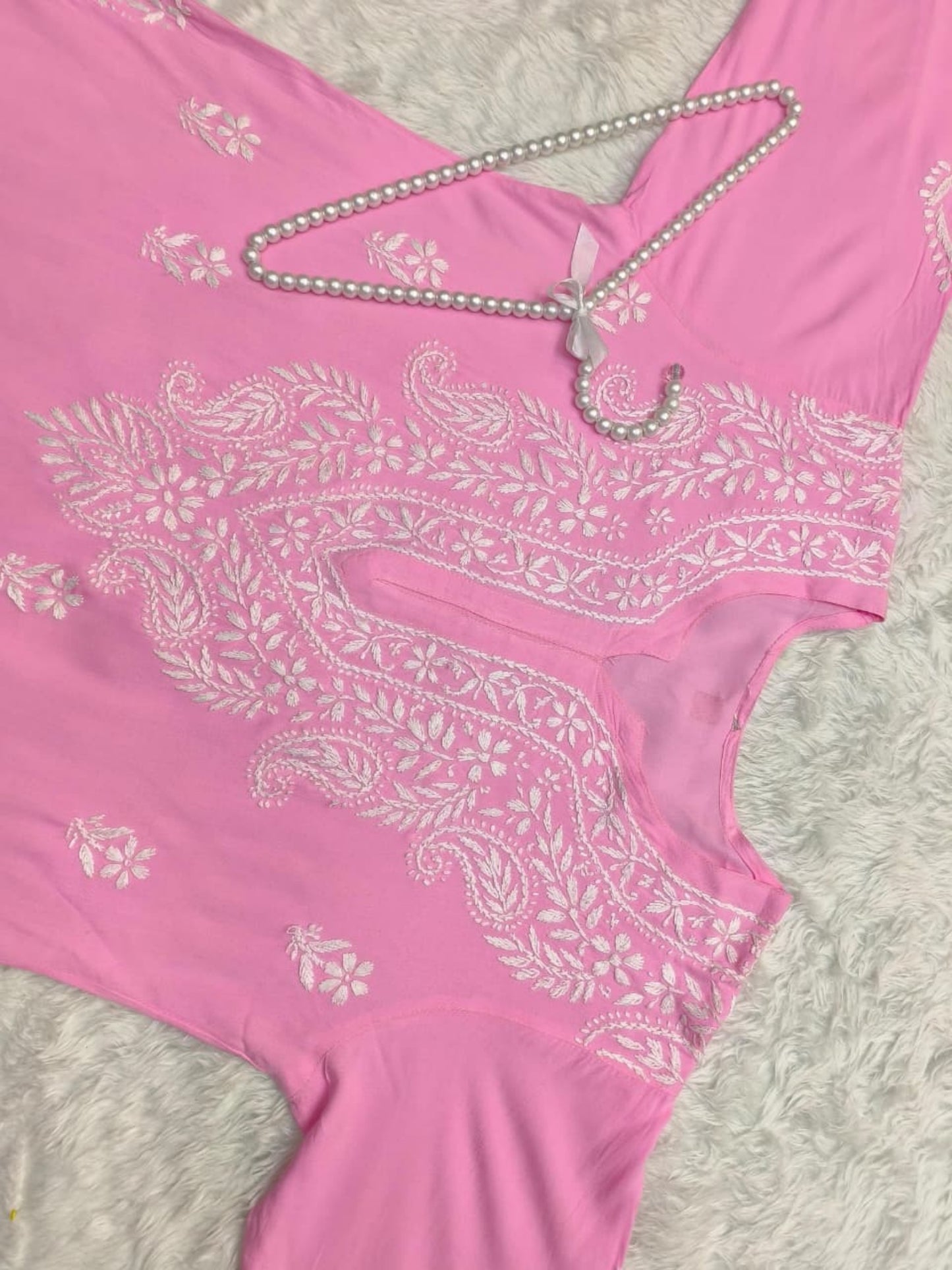Pink rayon Lucknow chikankari kurta with hand embroidery – soft and comfortable.