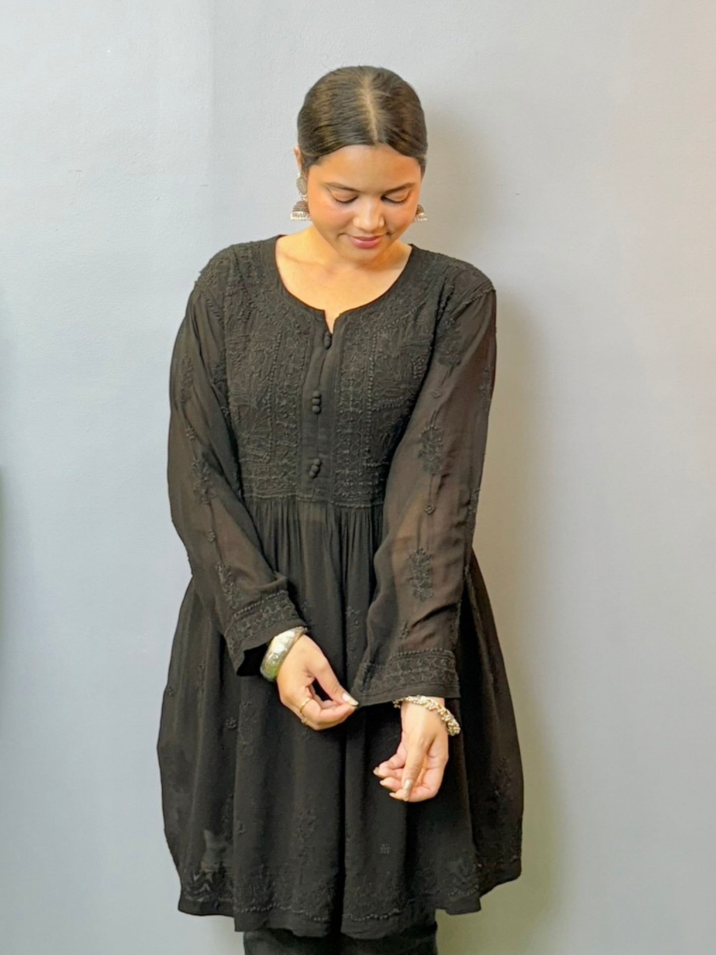 Elegant short black viscose chikankari kurta with full sleeves and subtle embroidery – perfect for daily wear
