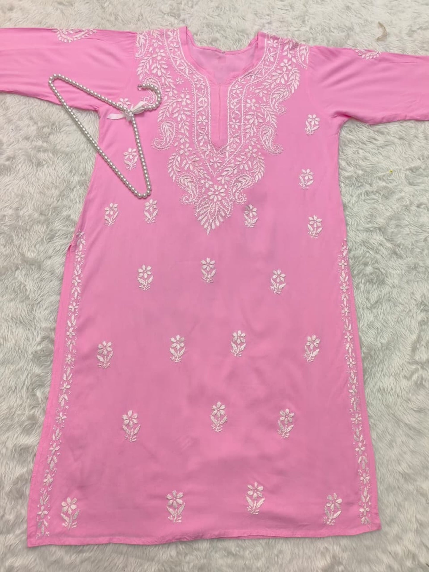 Pink rayon Lucknow chikankari kurta with hand embroidery – soft and comfortable.