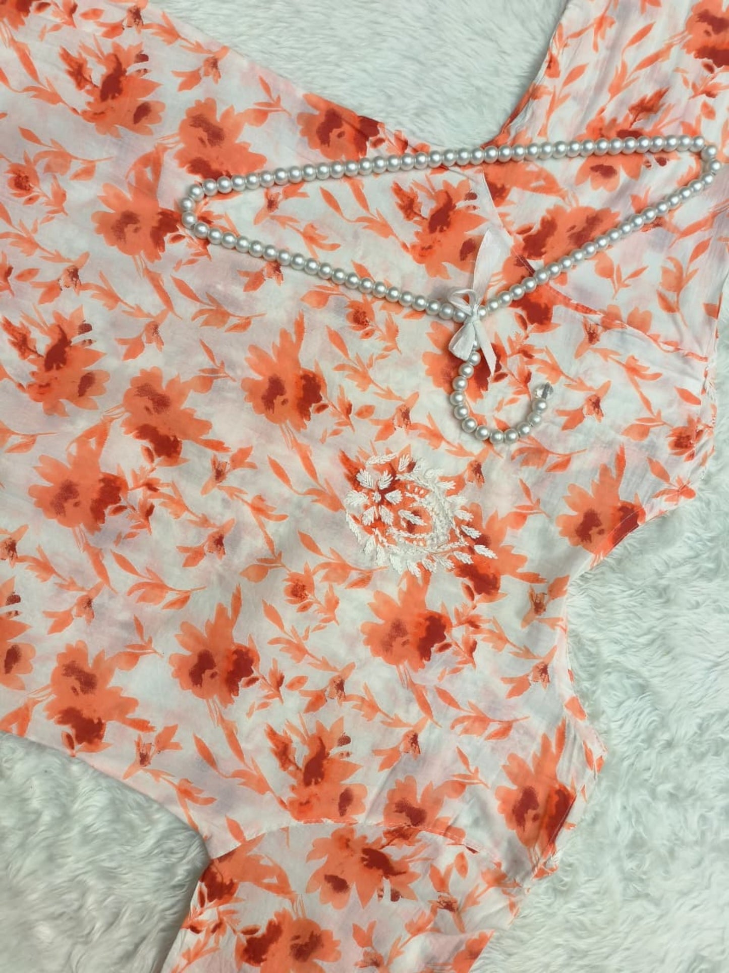 Orange printed mulmul chikankari kurta with hand embroidery