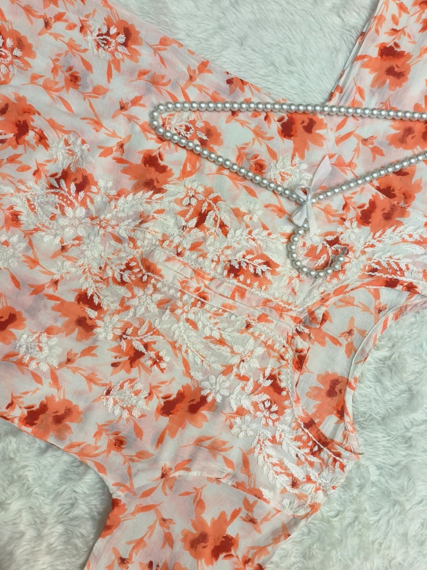 Orange printed mulmul chikankari kurta with hand embroidery