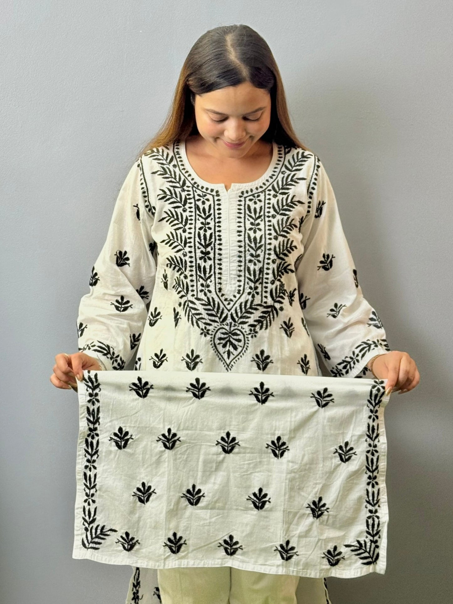 Ivory white mulmul chikankari kurta with black hand embroidery work