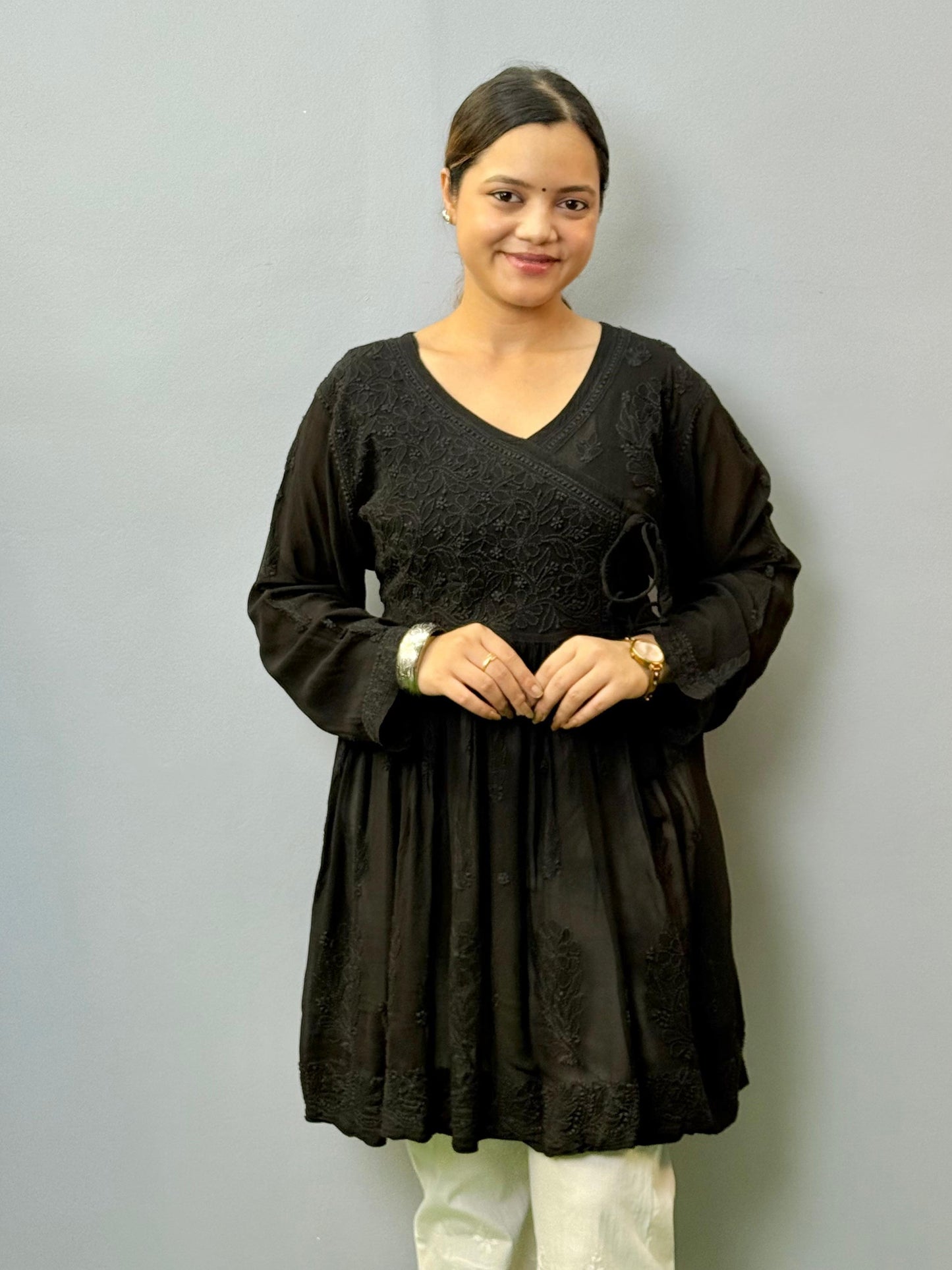 Black Lucknow chikankari short kurta with angrakha pattern in viscose transy fabric