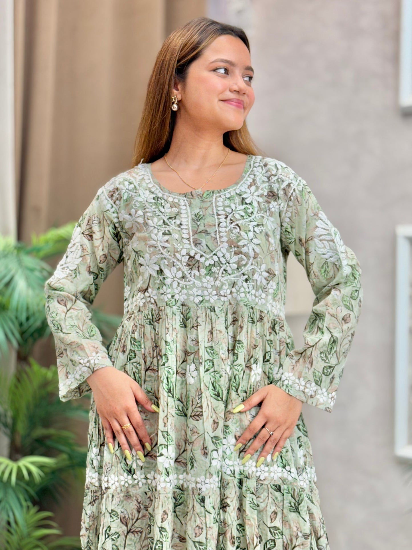 Sage green printed mulmul frock kurta with flared silhouette and Lucknow Chikankari embroidery