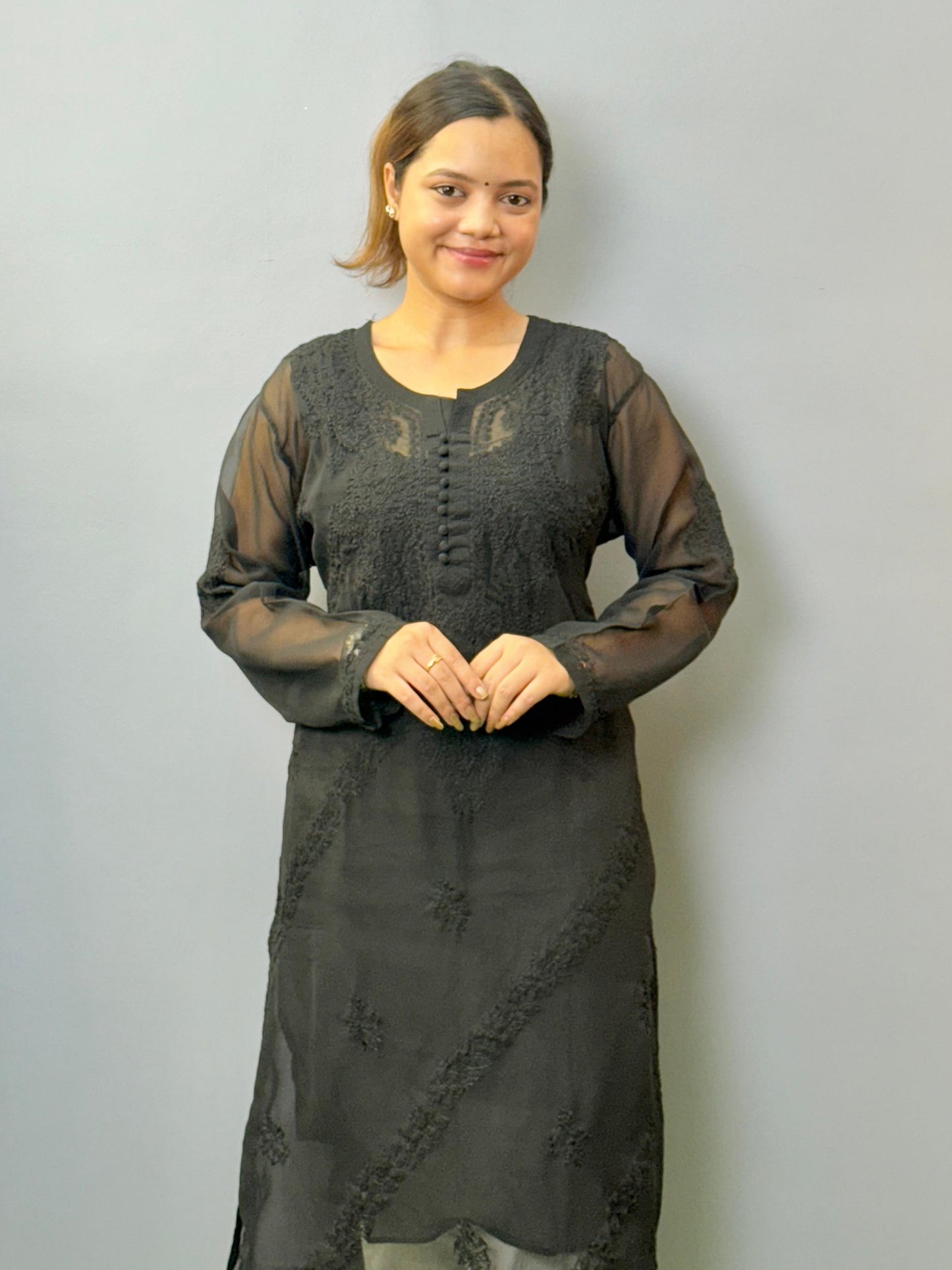 Black sheer georgette chikankari kurta with hand embroidery and straight fit