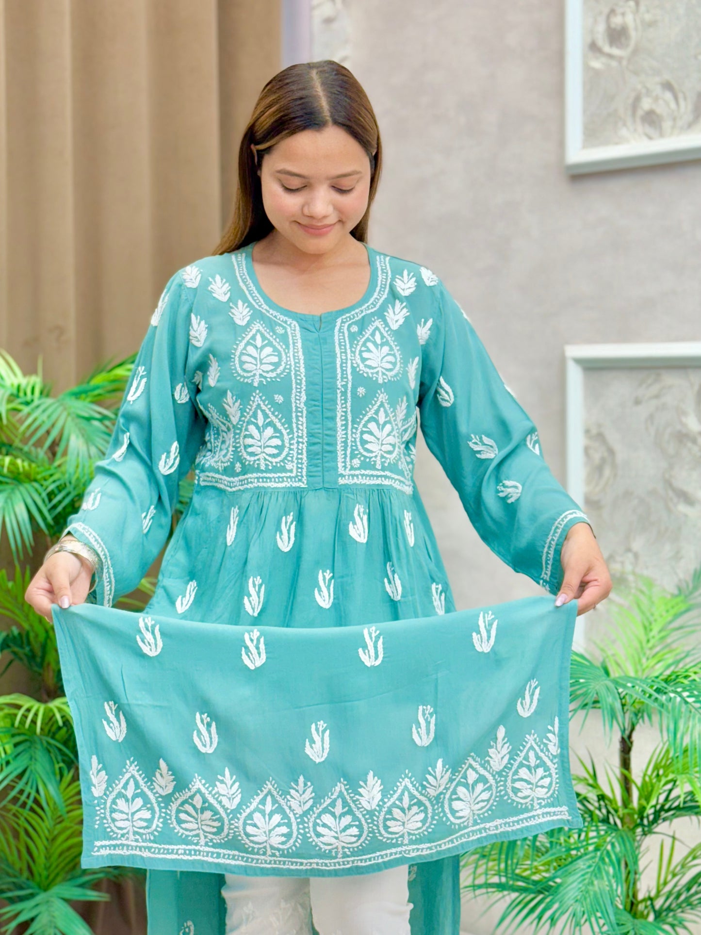Aqua blue modal knee-length Lucknow Chikankari kurta with both-side pockets and hand embroidery
