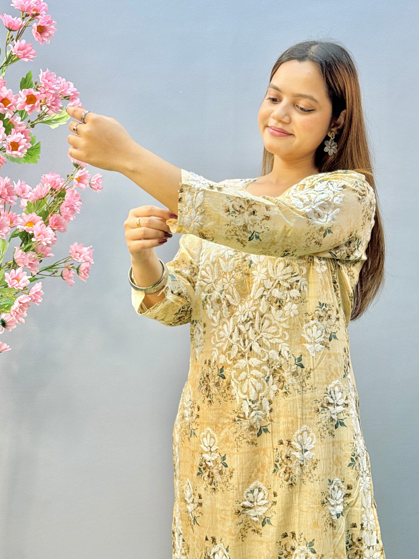 Beige floral mulmul chikankari kurta and palazzo set with lace detailing