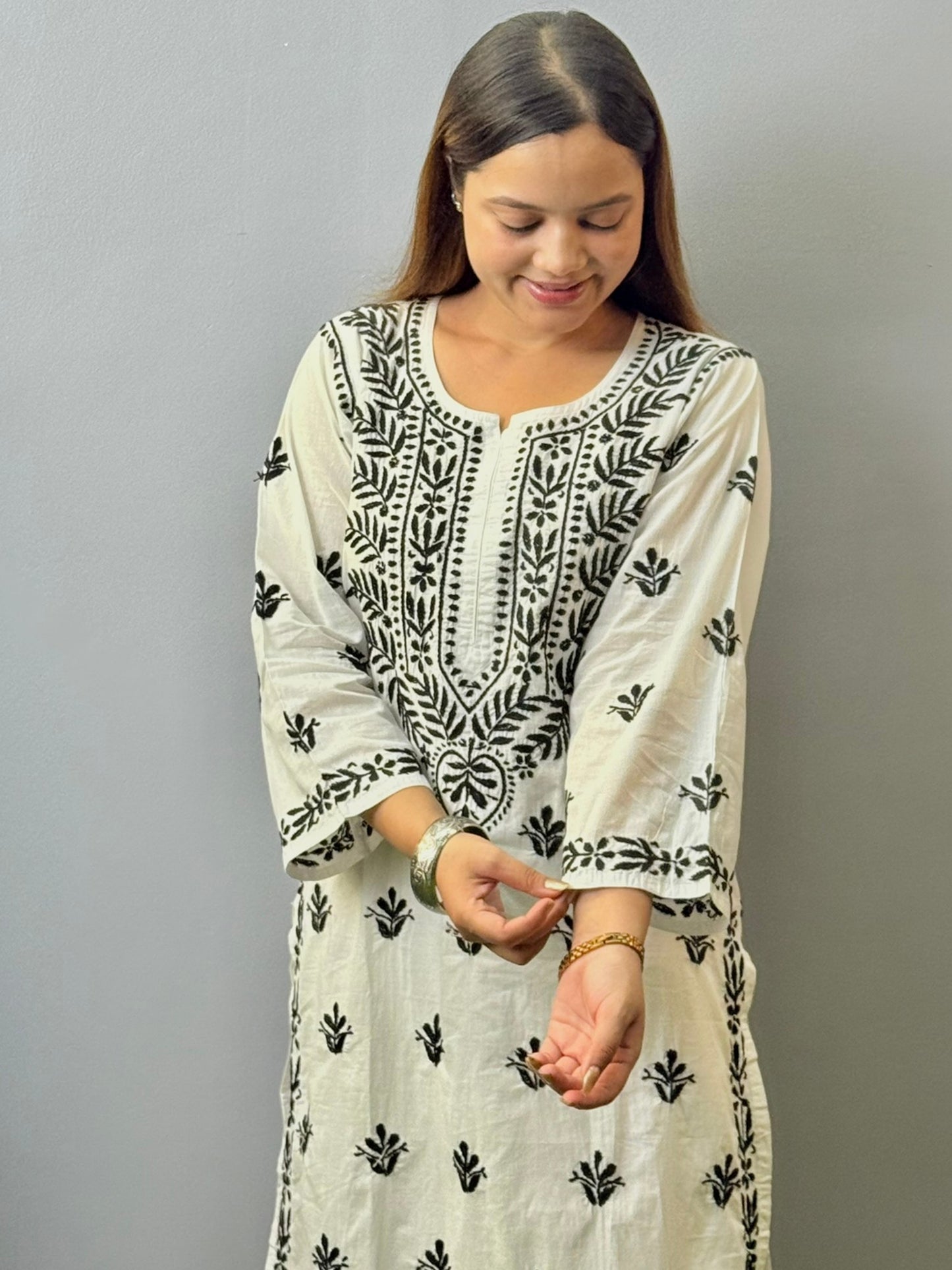 Ivory white mulmul chikankari kurta with black hand embroidery work