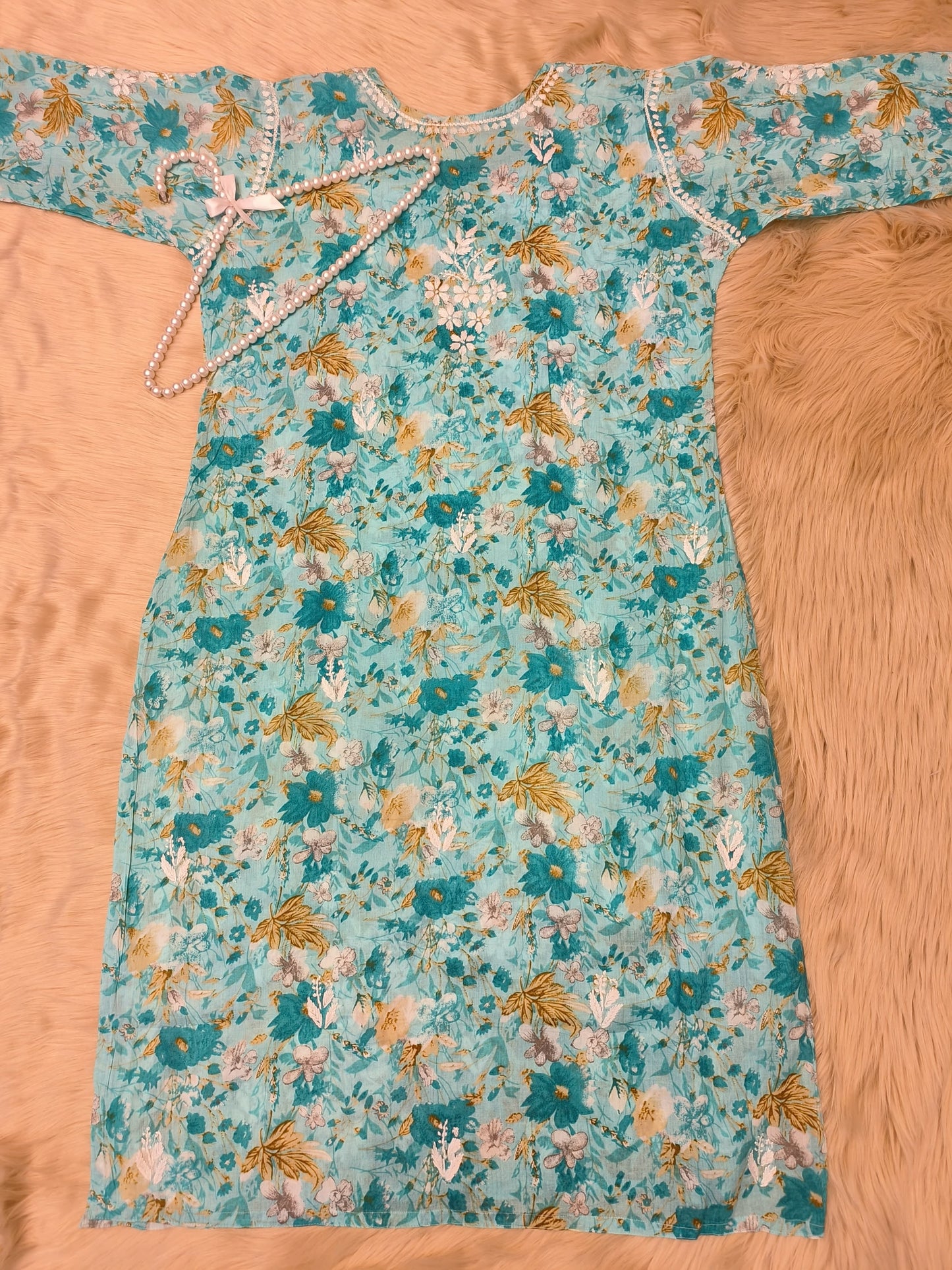 Turquoise floral printed mulmul chikankari kurta with white and mustard embroidery