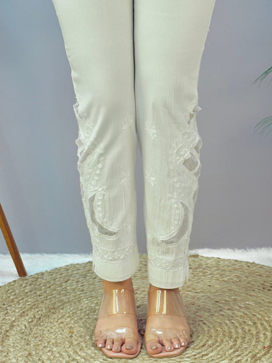 White dyable Lucknow Chikankari straight pant in cotton lycra fabric with delicate hand embroidery β stretchable and versatile.
