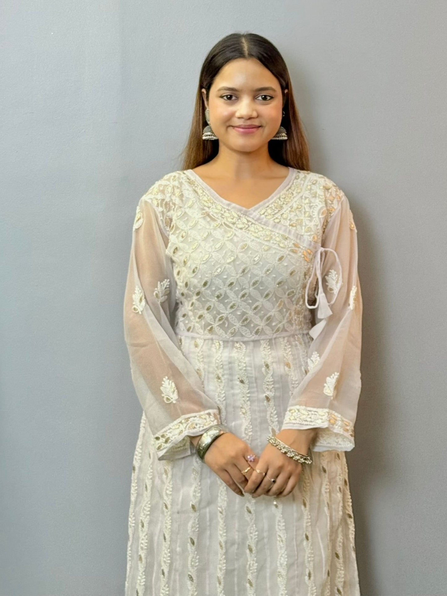 White long georgette frock with Lucknowi Chikankari embroidery and angrakha neck style