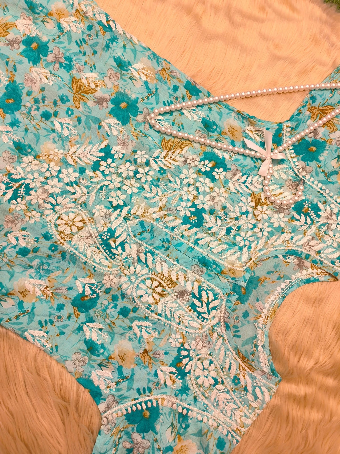Turquoise floral printed mulmul chikankari kurta with white and mustard embroidery