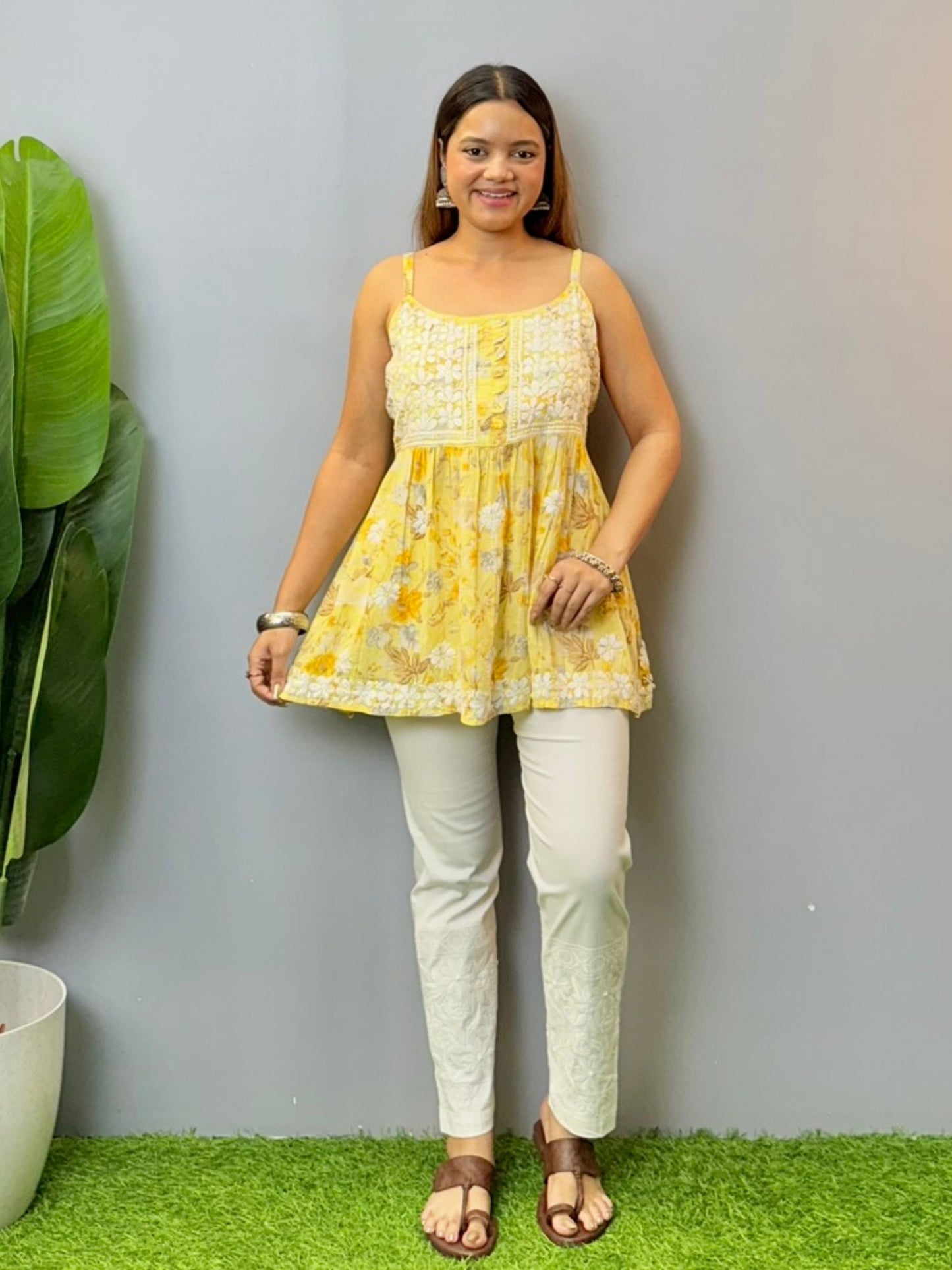 Mustard yellow floral printed mulmul chikankari short kurta with sleeveless straps and delicate hand embroidery