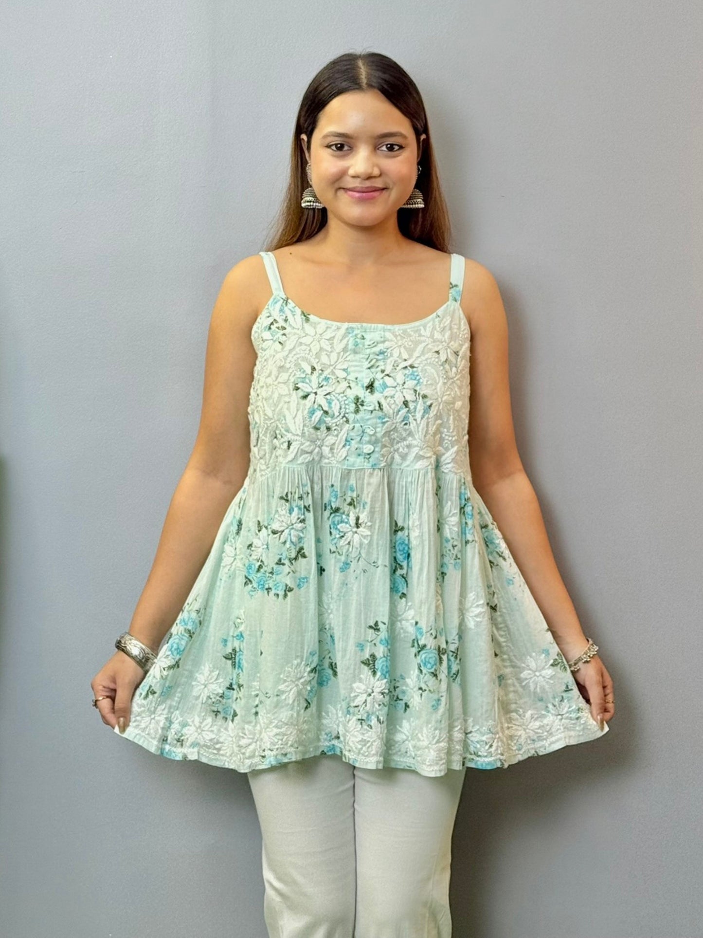 Printed mint green sleeveless short chikankari kurta in mulmul fabric with hand embroidery