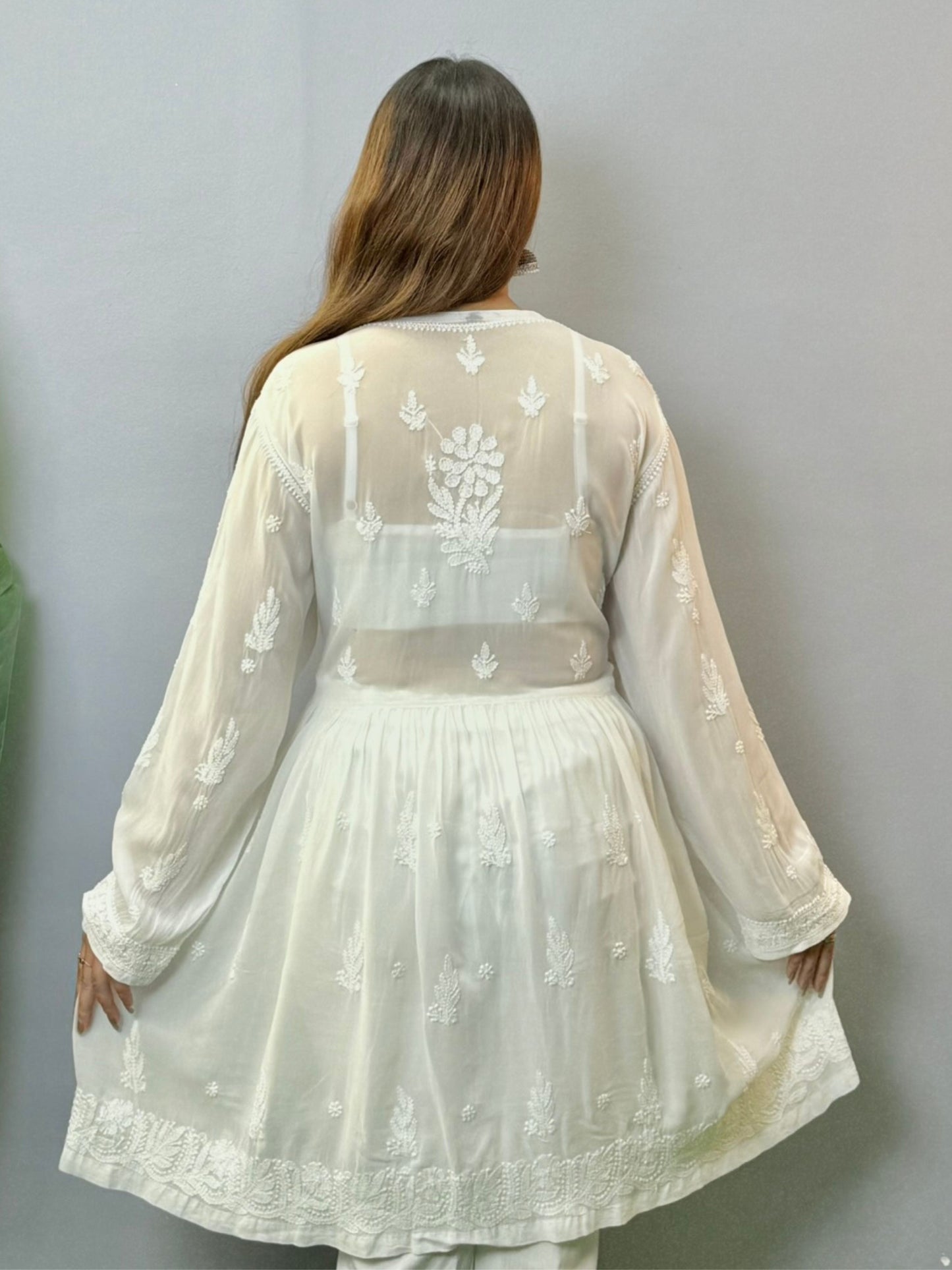 White angrakha-style short chikankari kurta in viscose fabric with hand embroidery