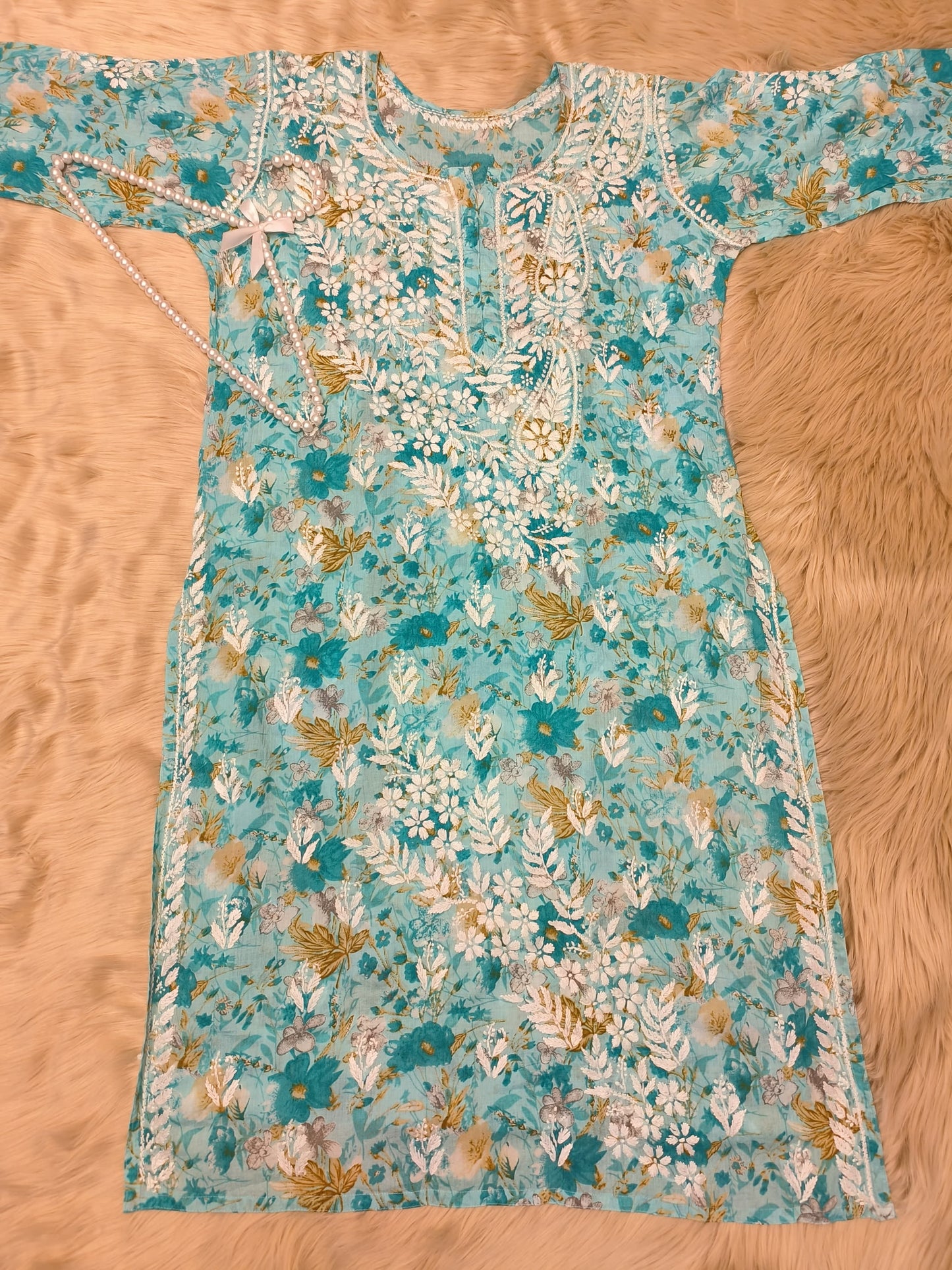Turquoise floral printed mulmul chikankari kurta with white and mustard embroidery