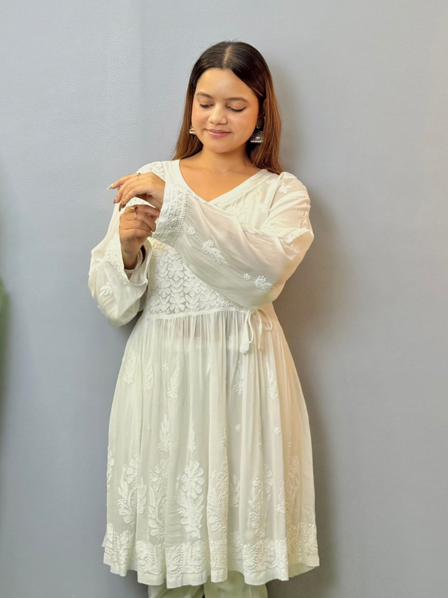White angrakha-style short chikankari kurta in viscose fabric with hand embroidery