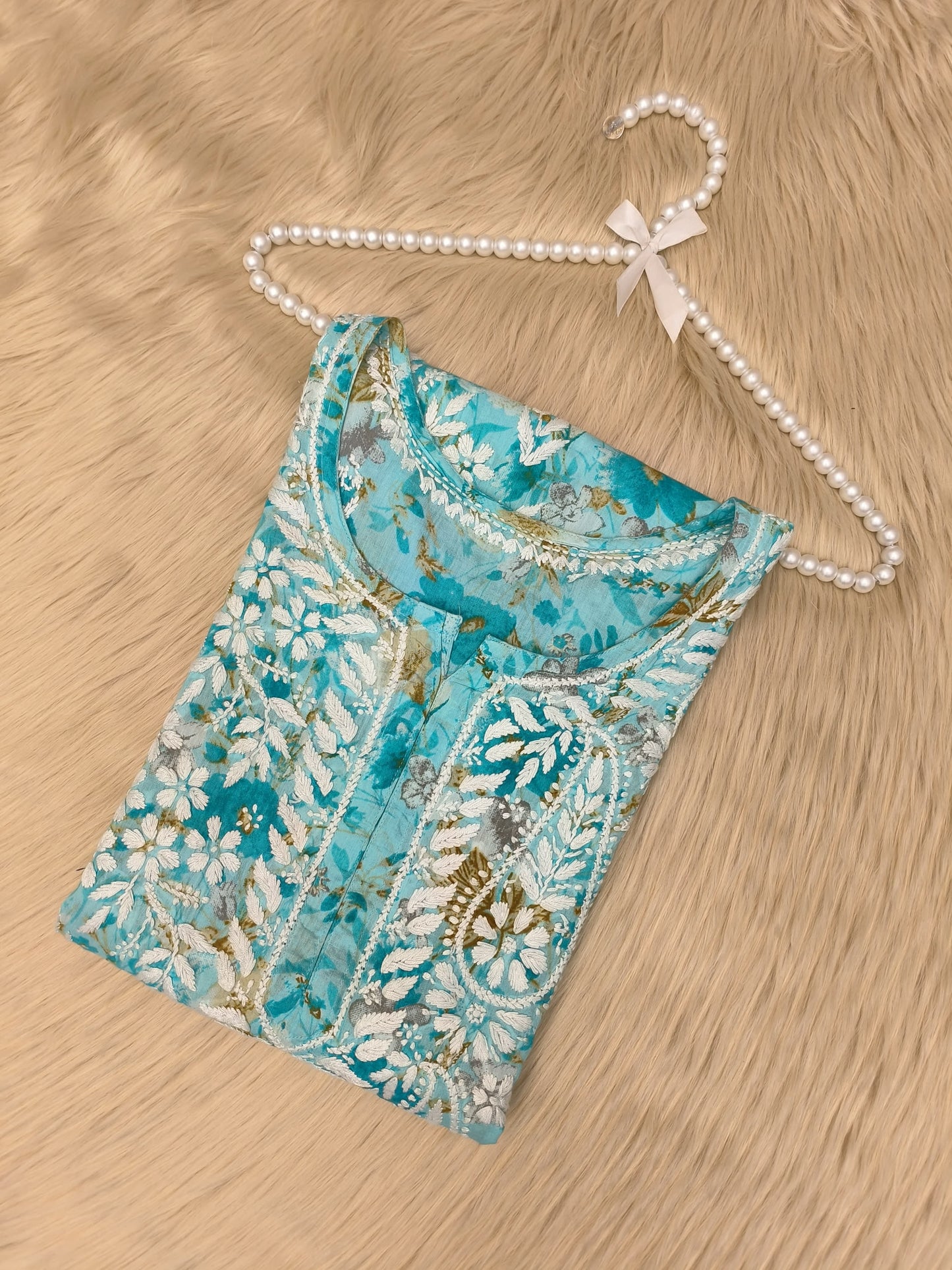 Turquoise floral printed mulmul chikankari kurta with white and mustard embroidery