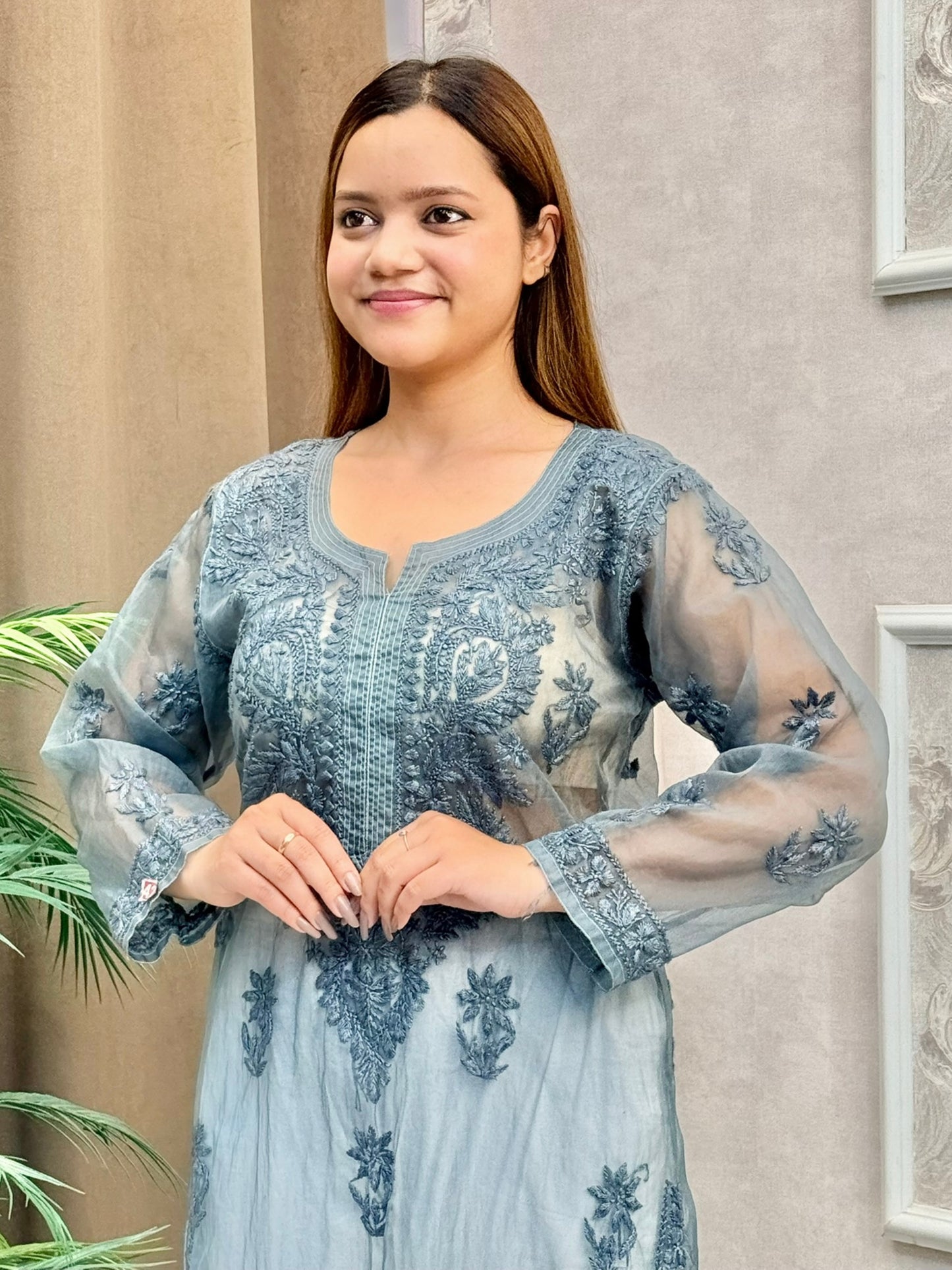 Smokey grey organza Lucknow Chikankari kurta featuring intricate tone-on-tone hand embroidery and side slits
