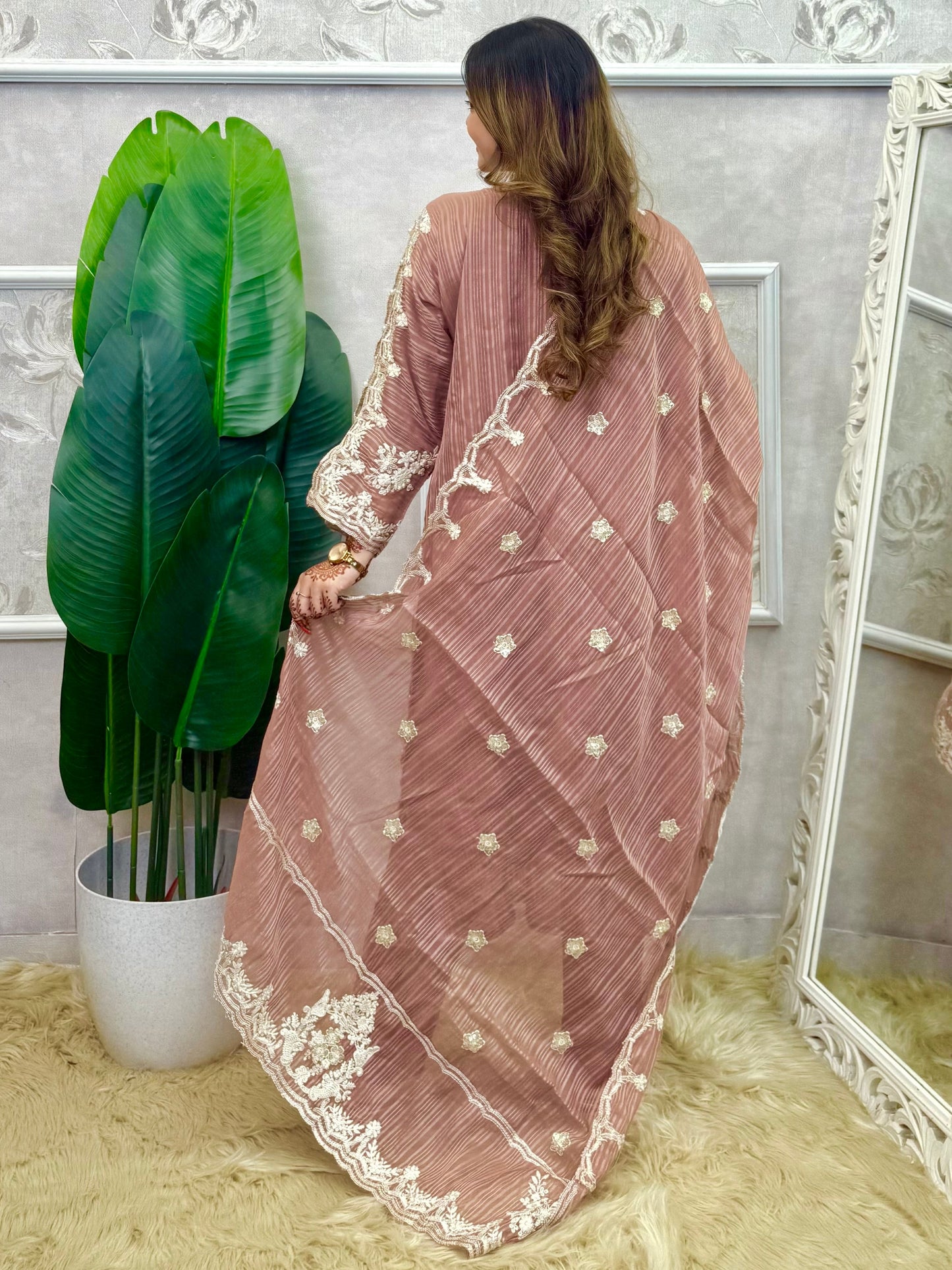 Model wearing a dusty brown soft organza kurta with hand embroidery, lycra stretchable pants, and a matching embroidered soft organza dupatta – Designer Wear Collection.