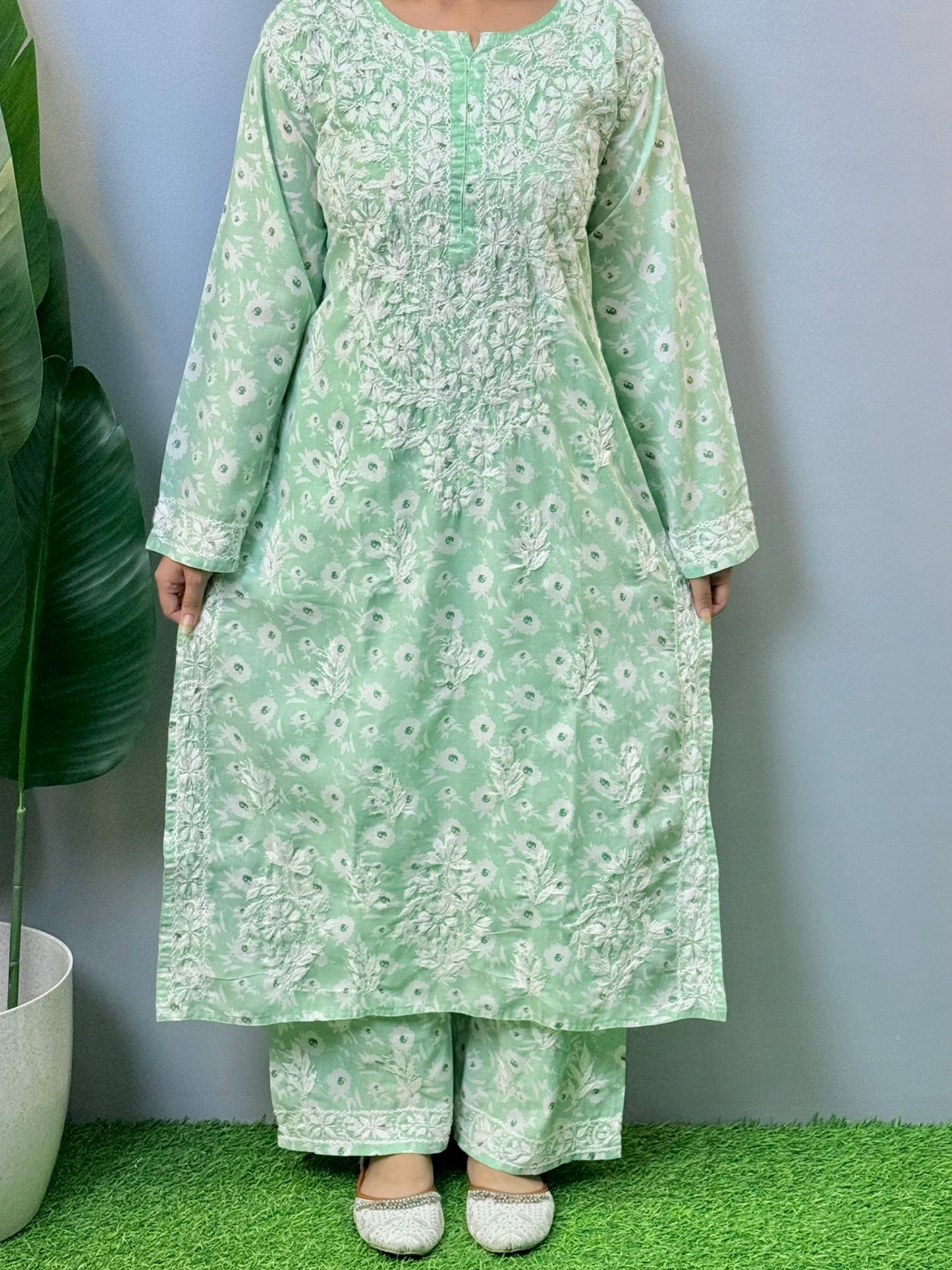 Pastel green cotton printed kurta and palazzo set with white Lucknowi Chikankari embroidery – soft and breathable ethnic wear