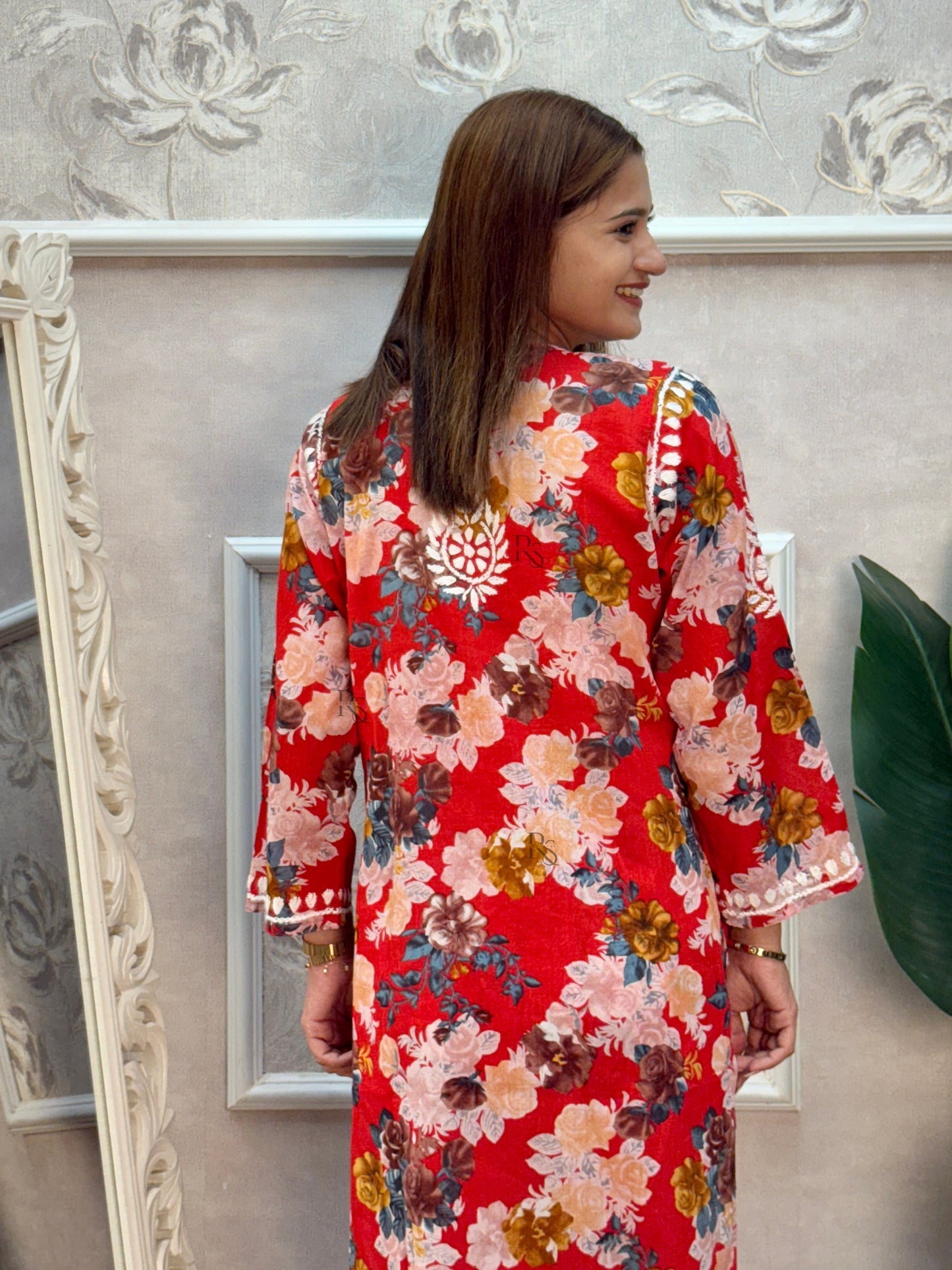 Red printed mulmul Lucknow Chikankari kurta and palazzo set with hand embroidery