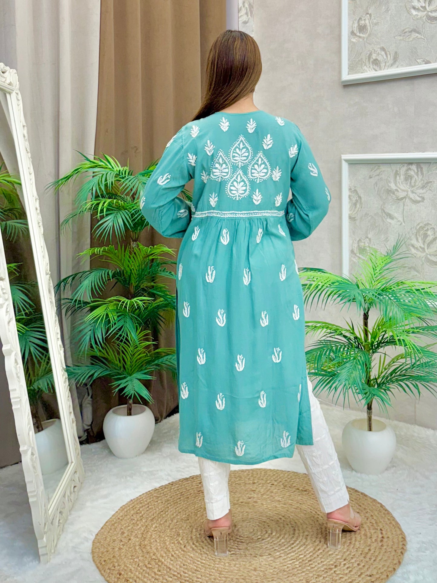Aqua blue modal knee-length Lucknow Chikankari kurta with both-side pockets and hand embroidery