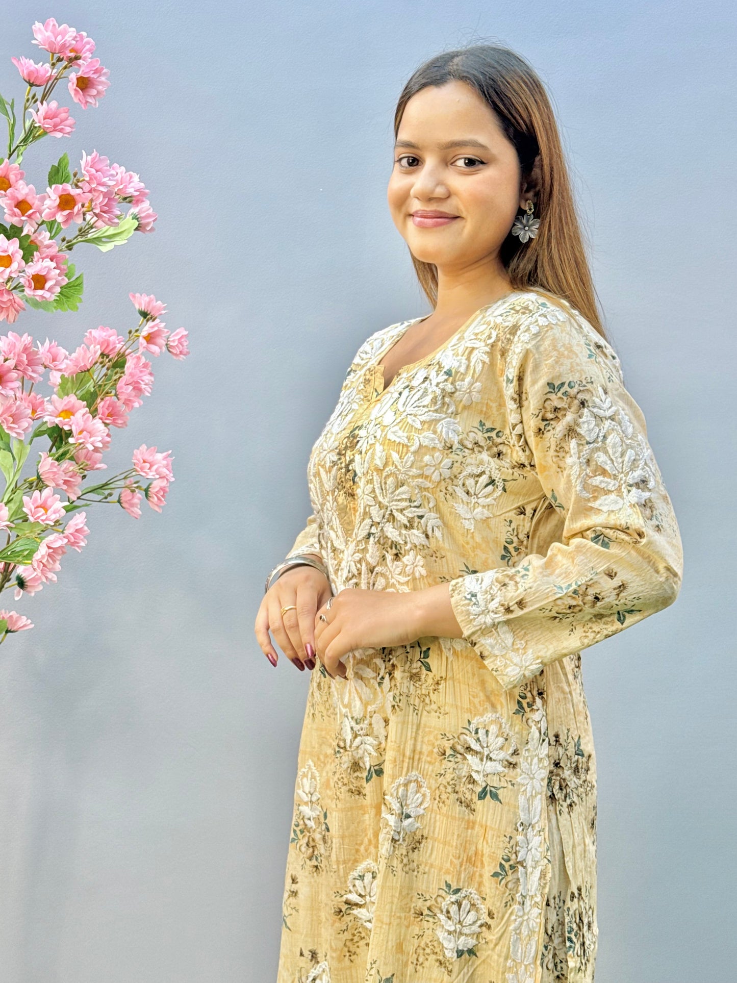Beige floral mulmul chikankari kurta and palazzo set with lace detailing