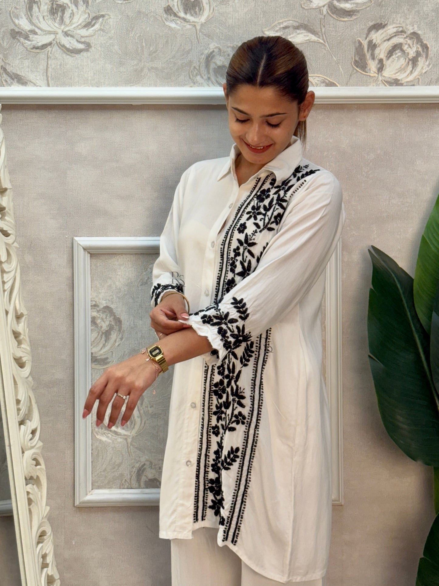 White rayon Lucknow Chikankari kurta and palazzo set with black thread hand embroidery