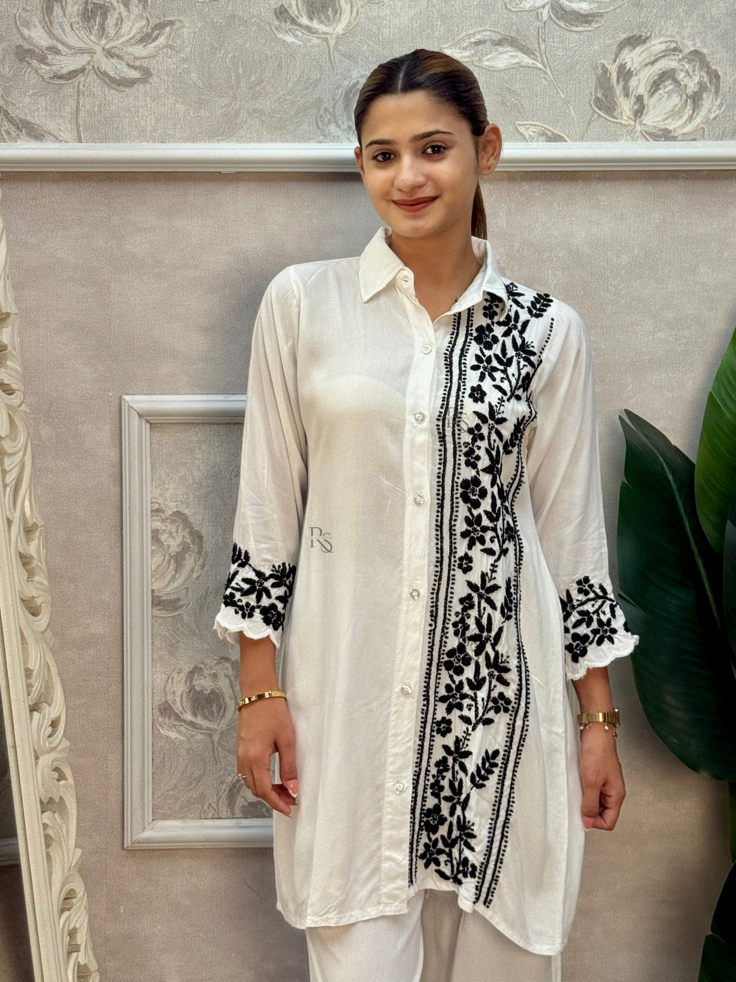 White rayon Lucknow Chikankari kurta and palazzo set with black thread hand embroidery