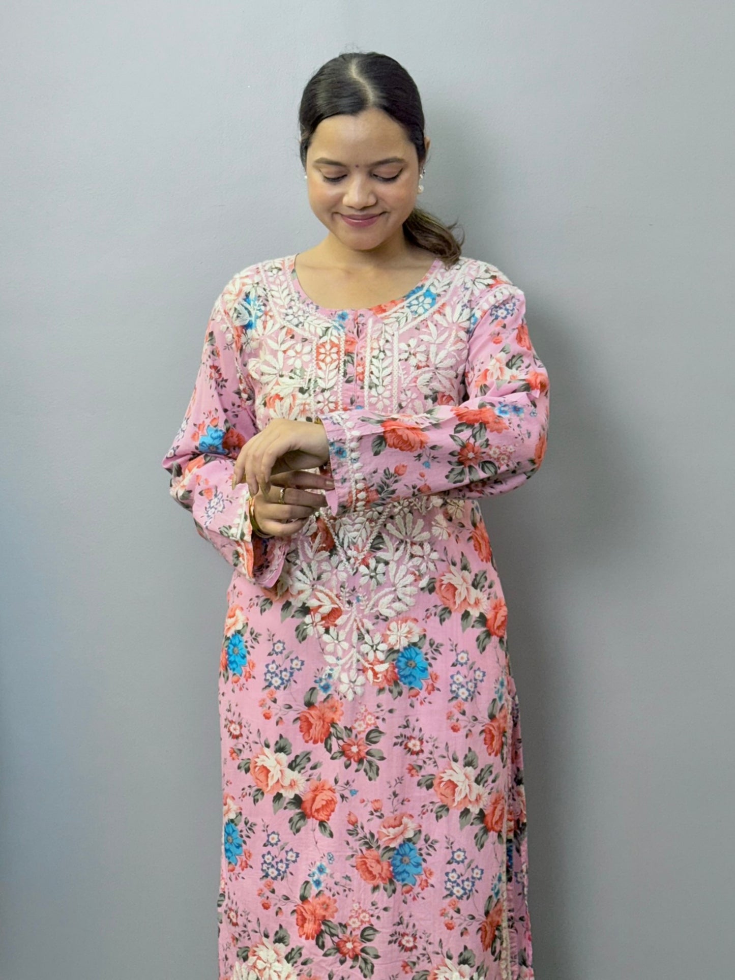 Printed pink mulmul kurta with floral design and white chikankari hand embroidery
