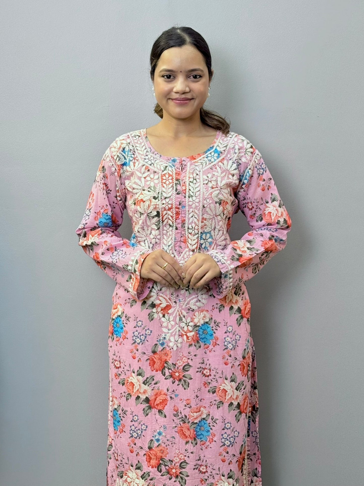 Printed pink mulmul kurta with floral design and white chikankari hand embroidery