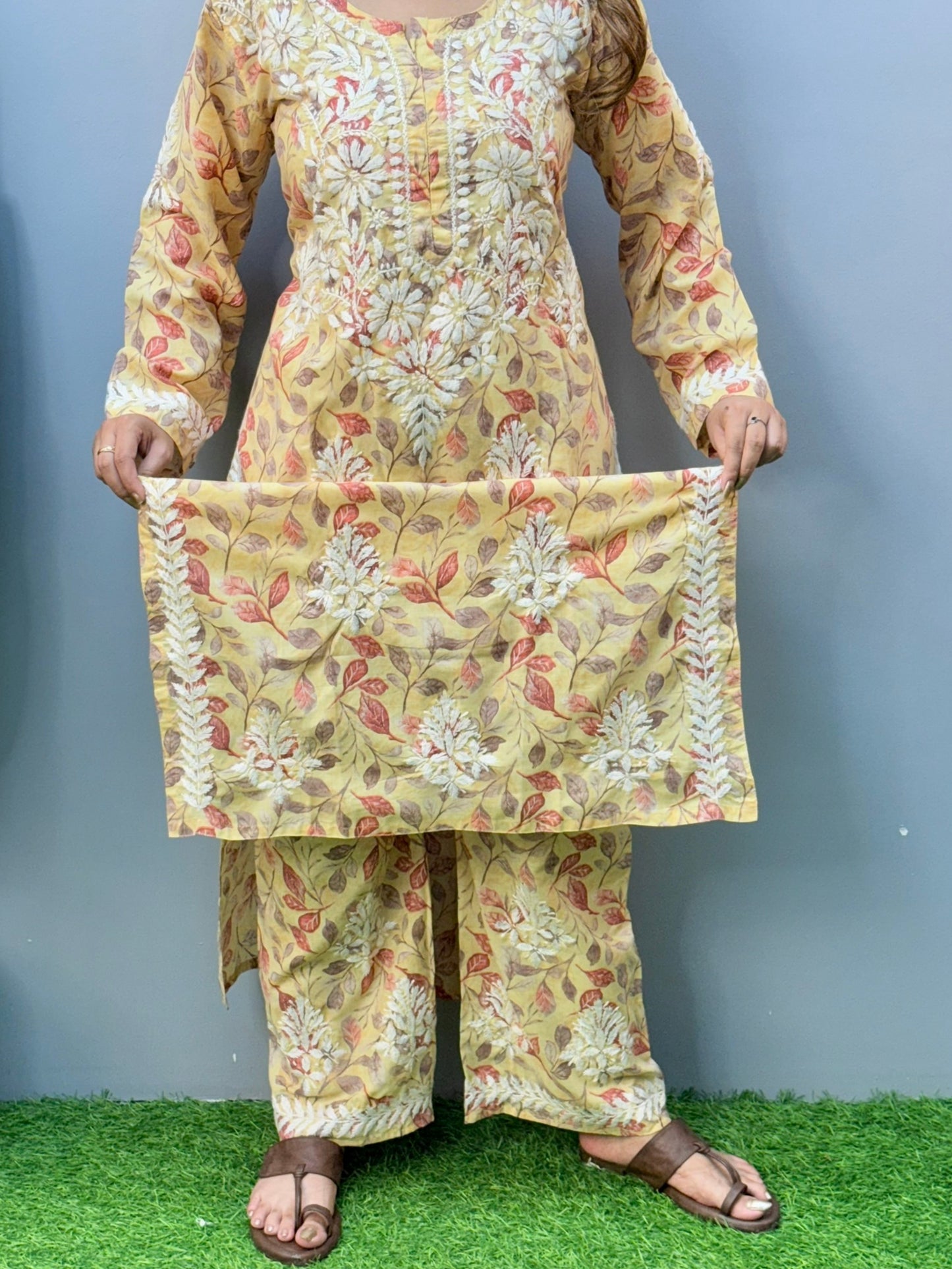 Mustard printed cotton chikankari kurta pant set with white hand embroidery and floral leaf pattern