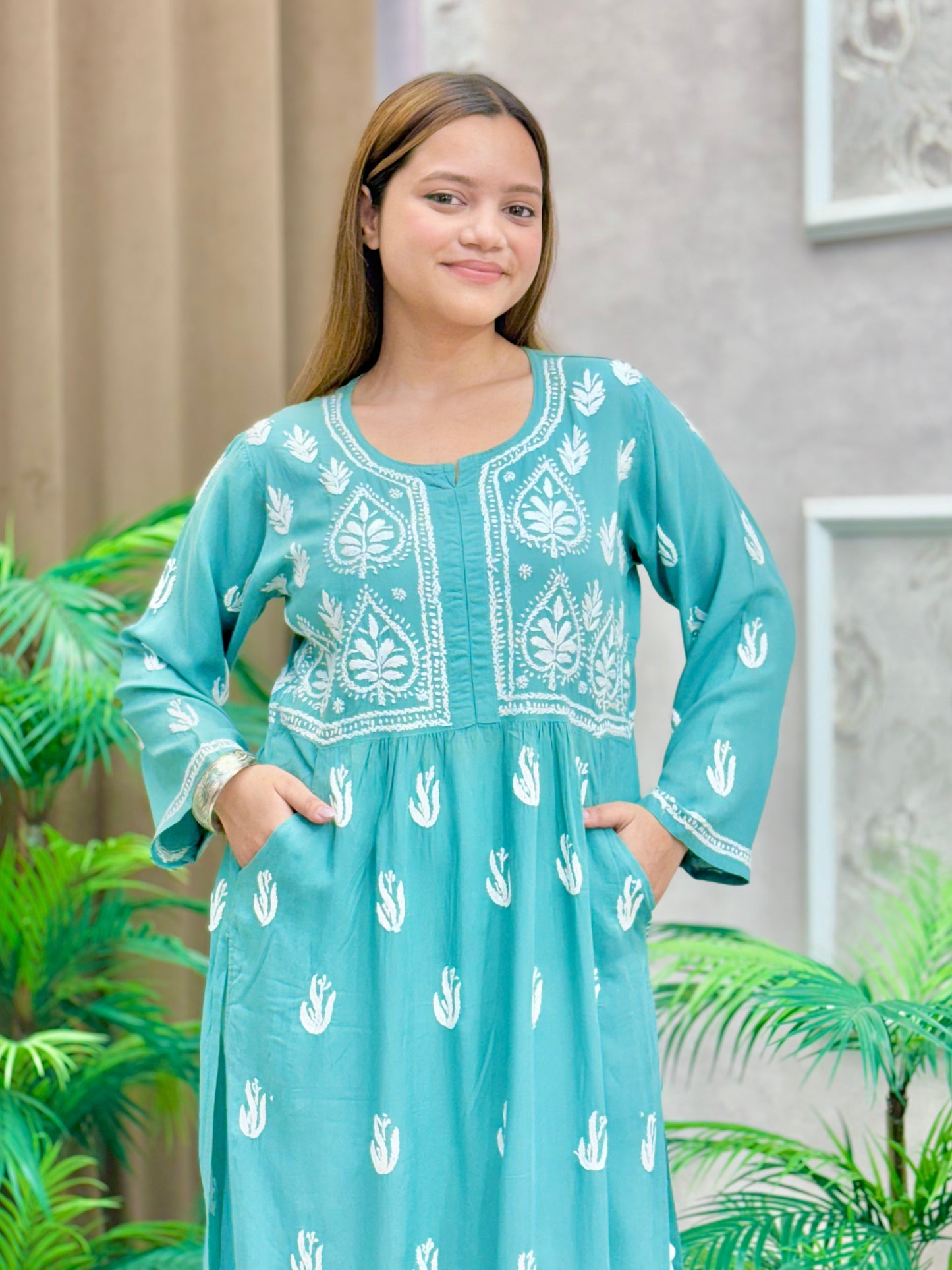 Aqua blue modal knee-length Lucknow Chikankari kurta with both-side pockets and hand embroidery