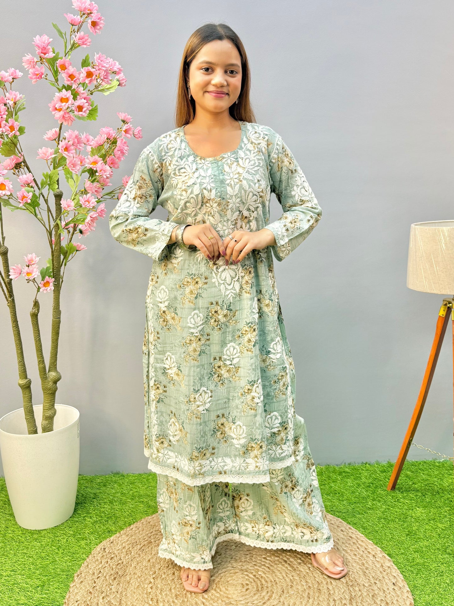Mint green floral mulmul chikankari kurta and palazzo set with lace detailing