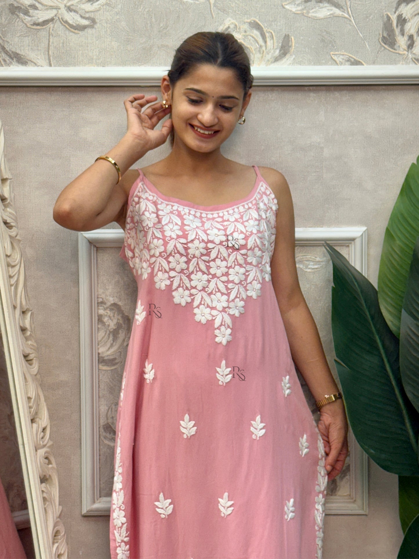 Pink sleeveless Lucknow Chikankari kurta and pant set with hand embroidery in rayon fabric