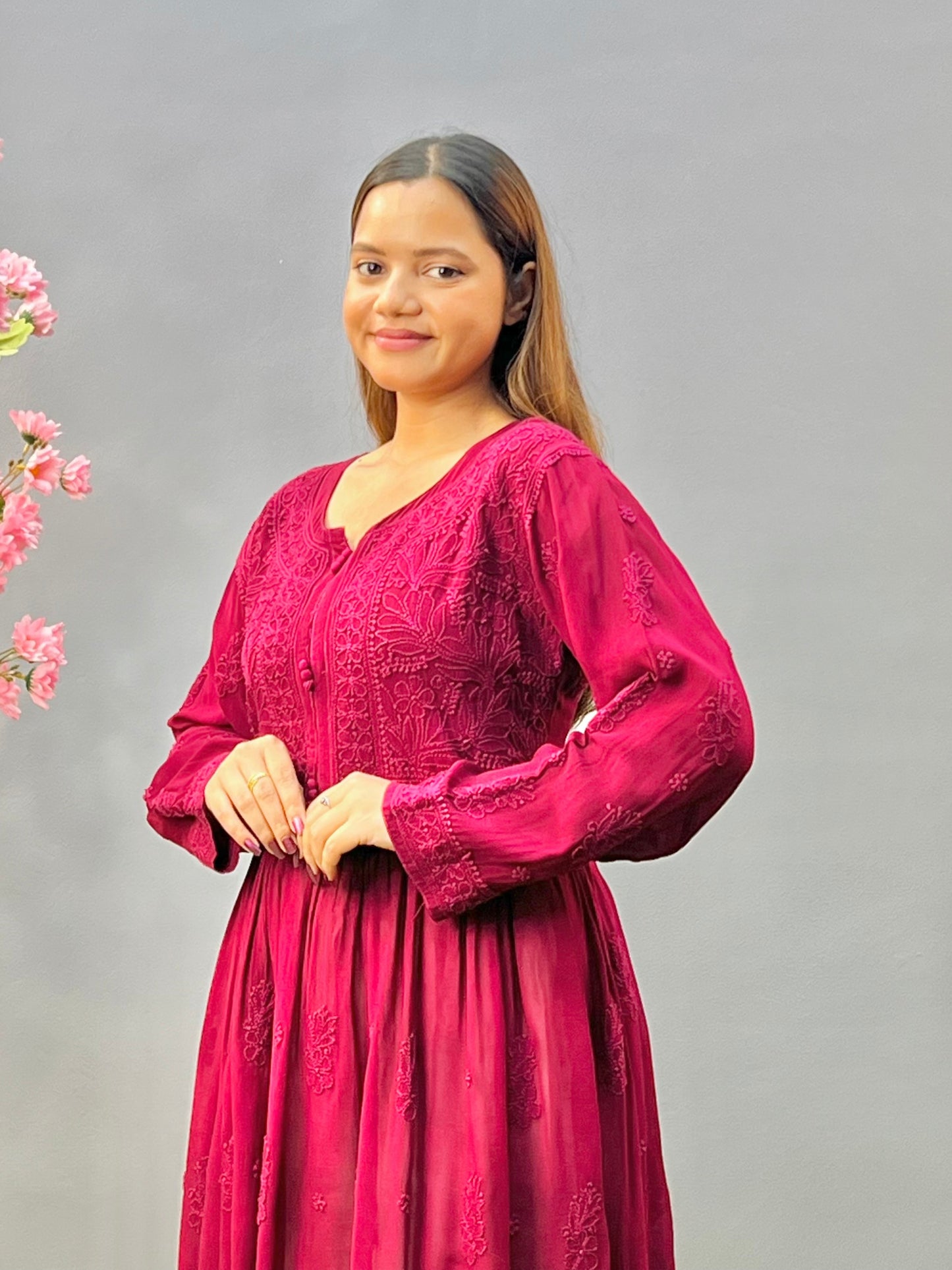 Woman wearing a premium wine red viscose Lucknowi Chikankari short frock with full sleeves and gathered waist, by R S CHIKANKARI.